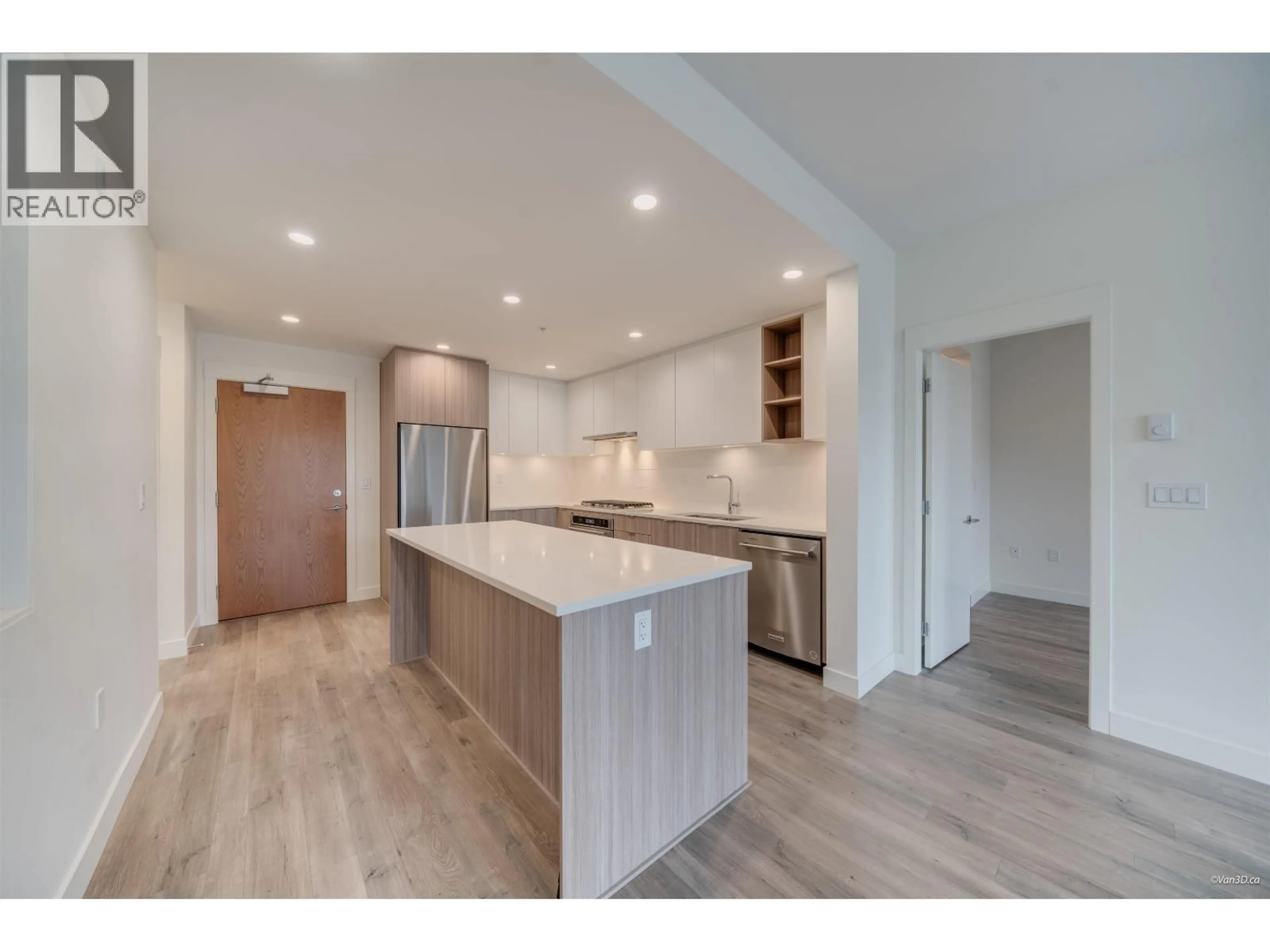 Open concept kitchen, wood/laminate floor for 304 - 750 DOGWOOD STREET, Coquitlam British Columbia V3J0K6