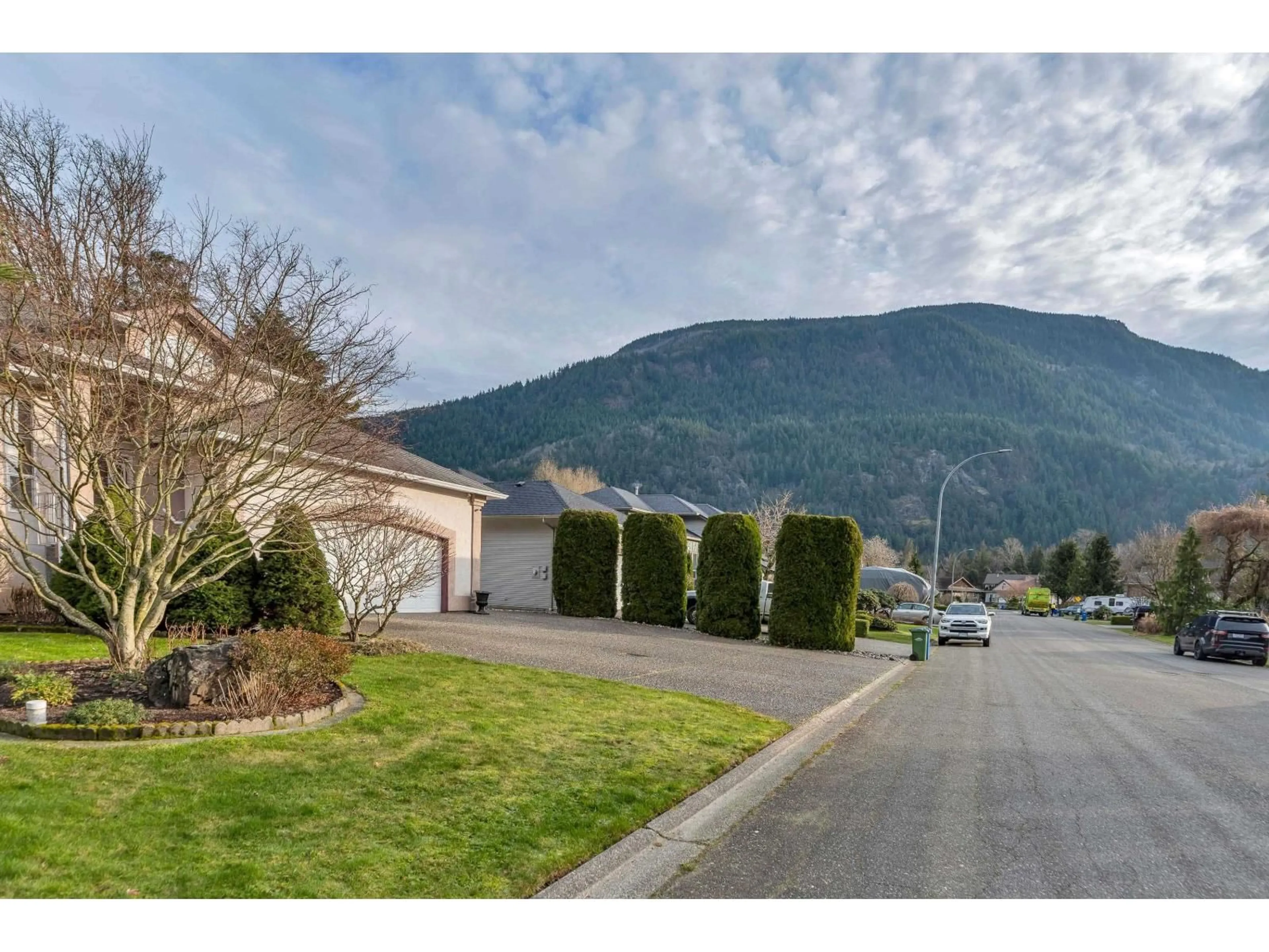 A pic from outside/outdoor area/front of a property/back of a property/a pic from drone, mountain view for 223 BALSAM AVENUE, Harrison Hot Springs British Columbia V0M1K0