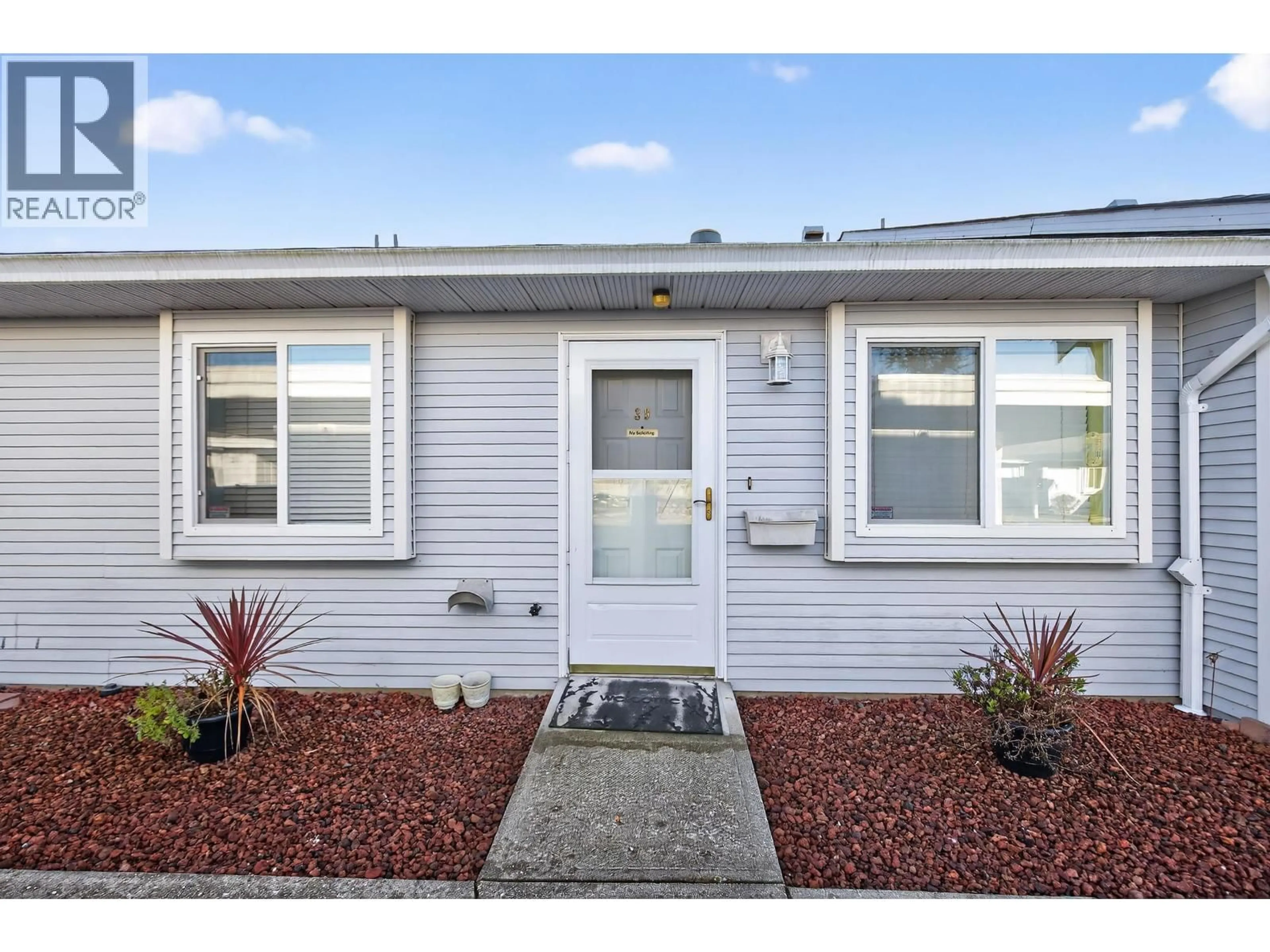 Home with vinyl exterior material, street for 39 - 23580 DEWDNEY TRUNK ROAD, Maple Ridge British Columbia V2X0S8