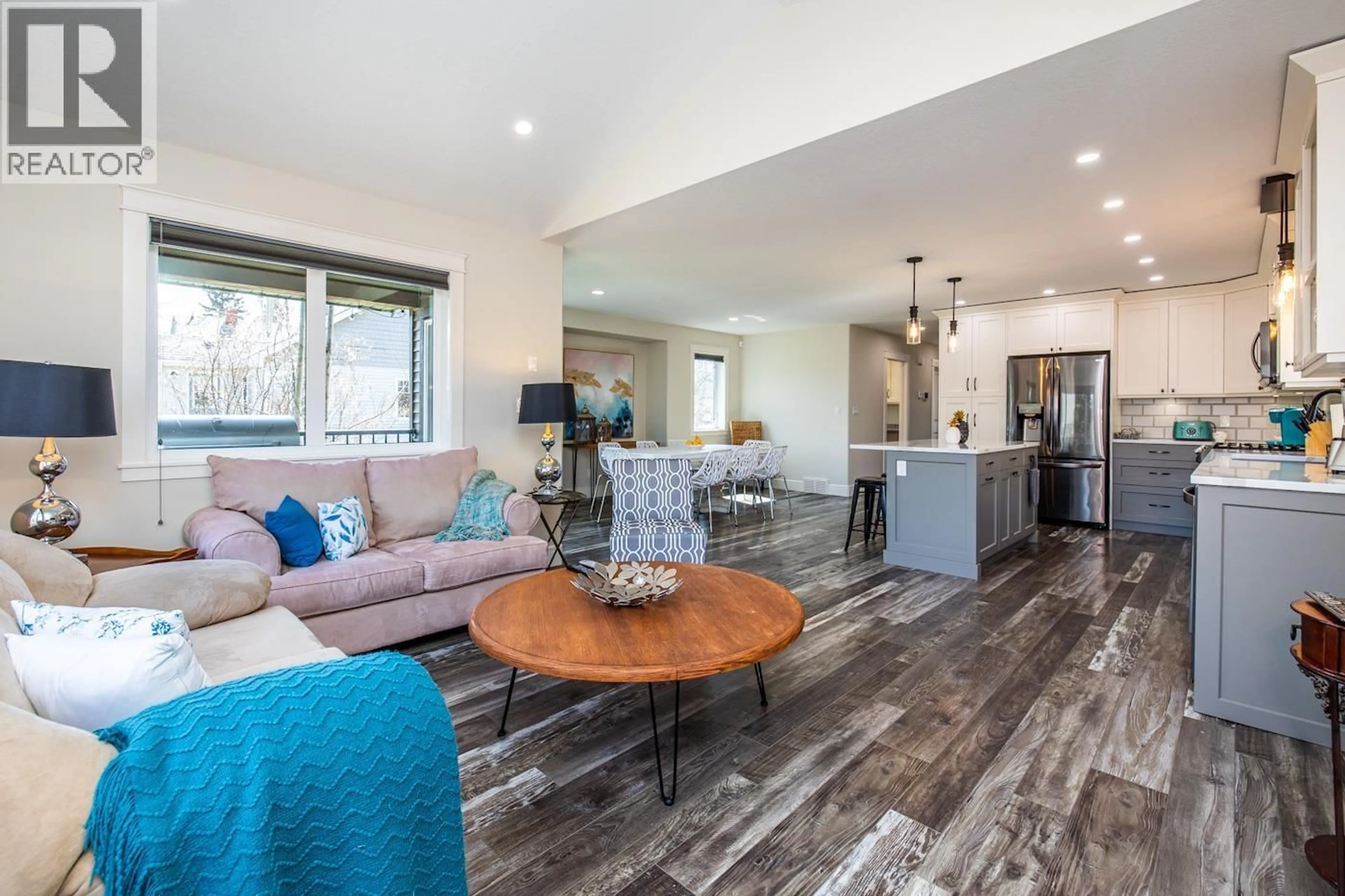 Open concept kitchen, wood/laminate floor for 246 BURDEN STREET, Prince George British Columbia V2M2G8