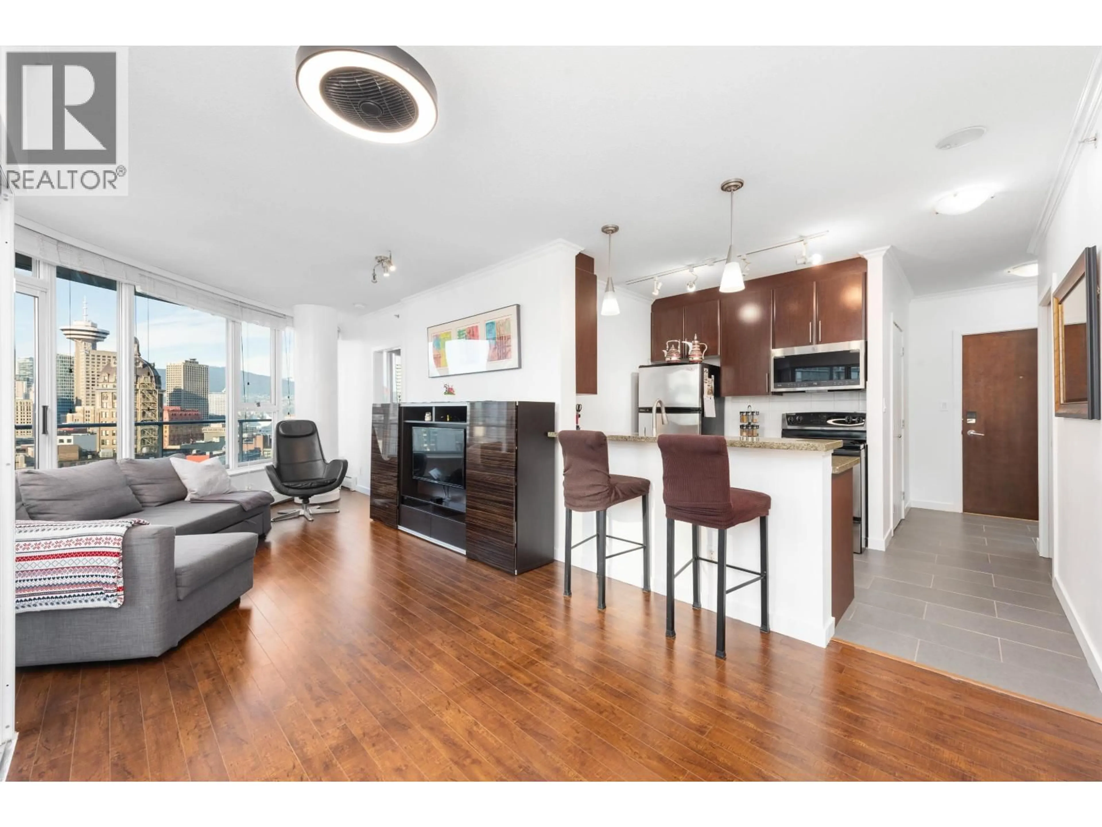 Open concept kitchen, wood/laminate floor for 2203 - 58 KEEFER PLACE, Vancouver British Columbia V6B0B8