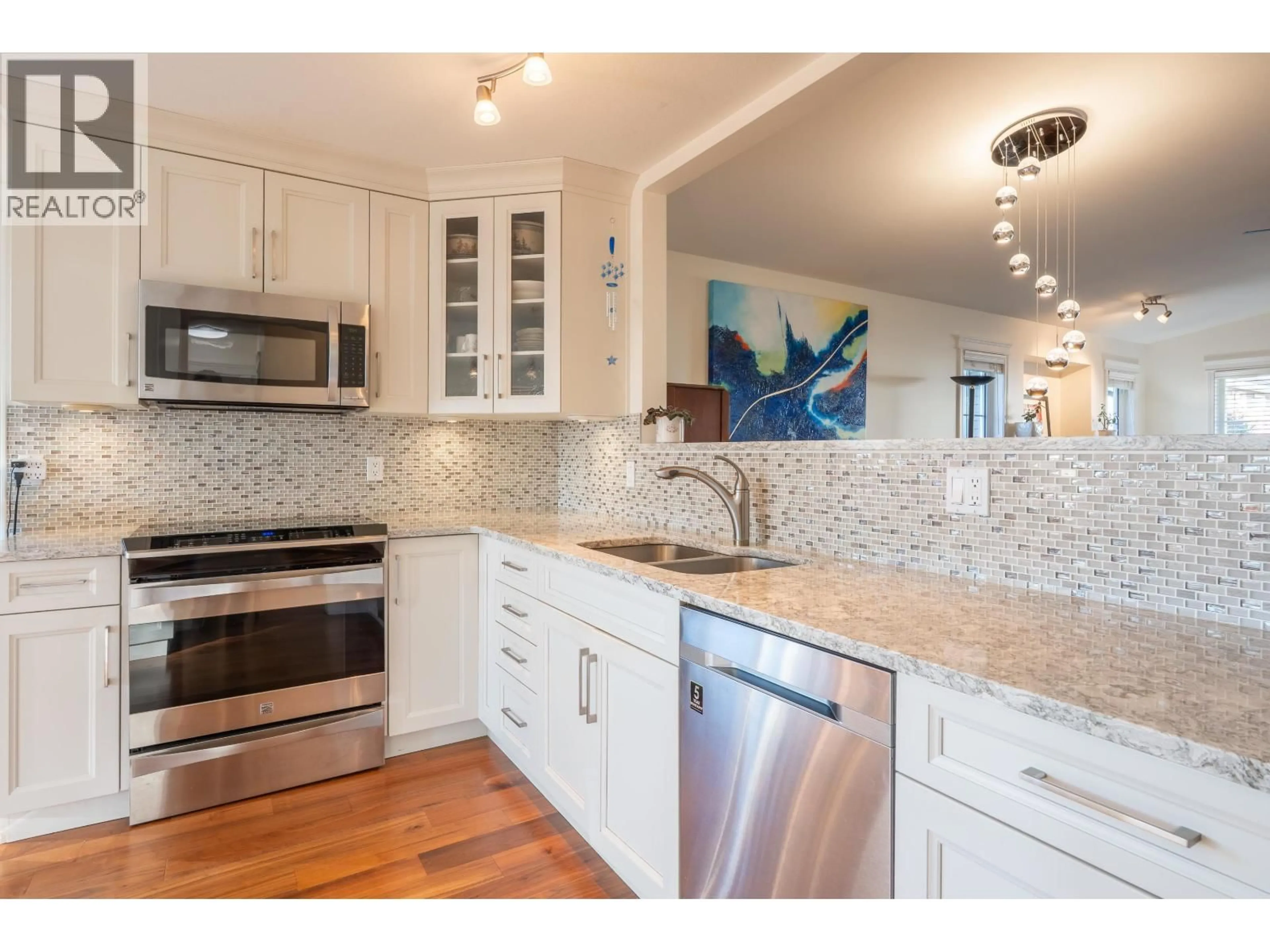 Open concept kitchen, ceramic/tile floor for 5696 EMILY WAY, Sechelt British Columbia V7Z0N5