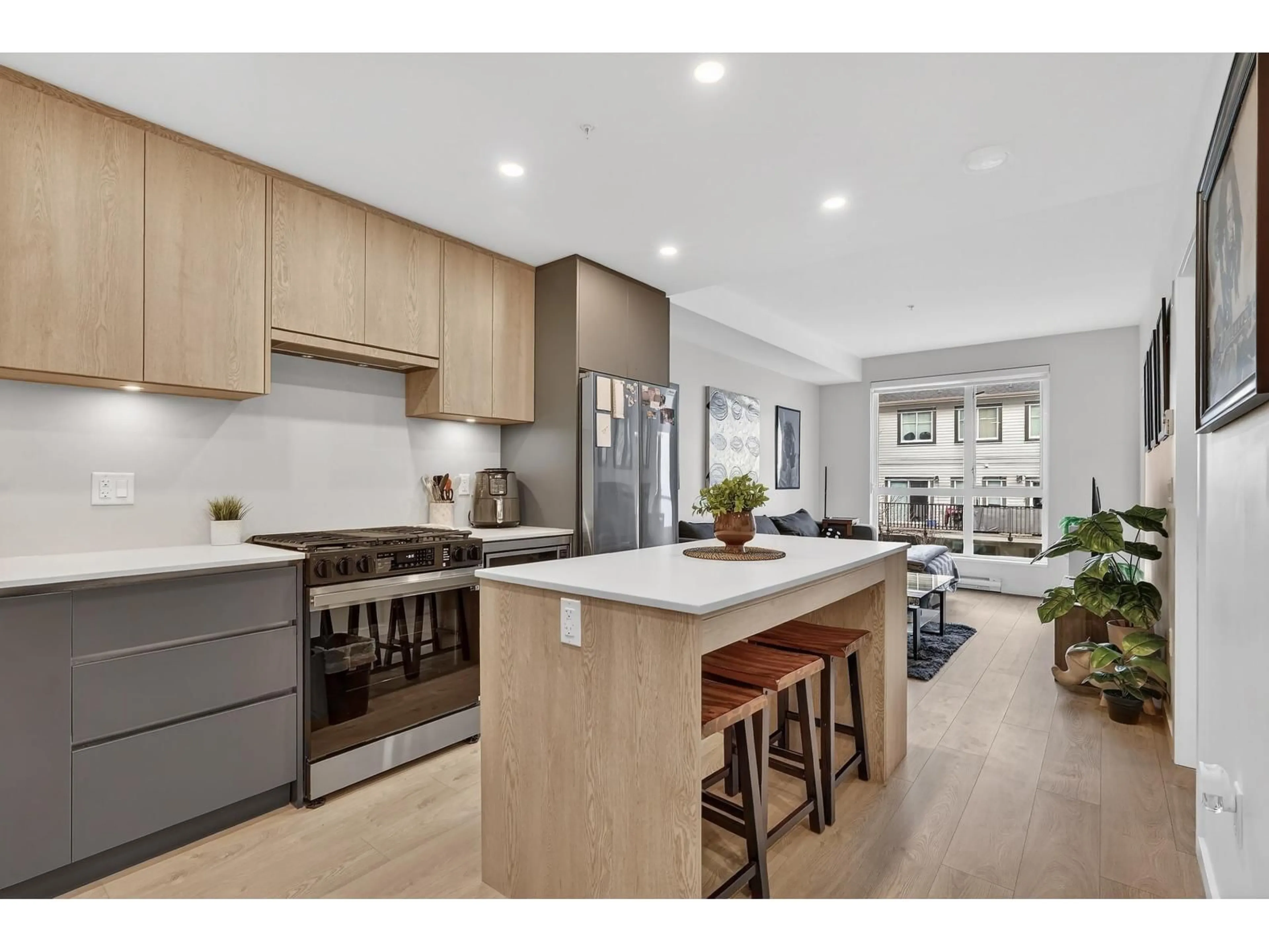 Open concept kitchen, unknown for 212 - 6585 195A STREET, Surrey British Columbia V4N6Y9