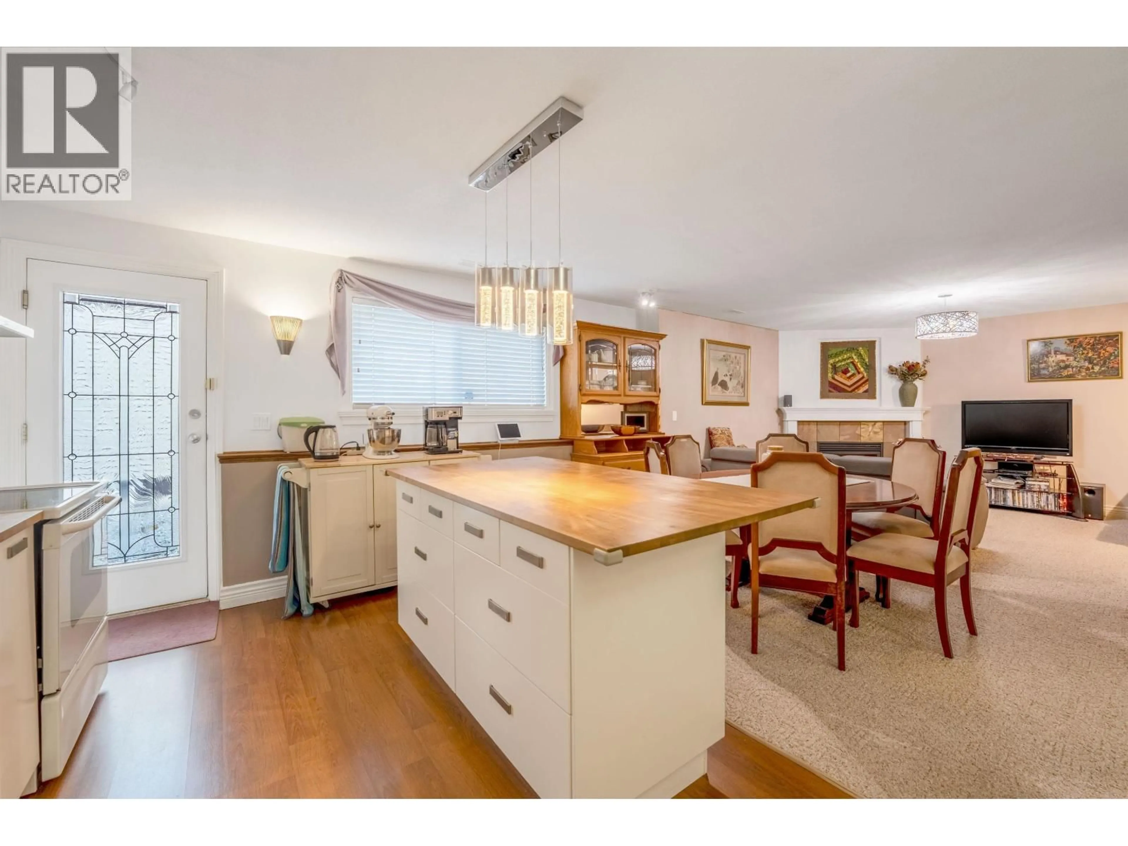 Open concept kitchen, wood/laminate floor for 3051 SIENNA COURT, Coquitlam British Columbia V3E3N7