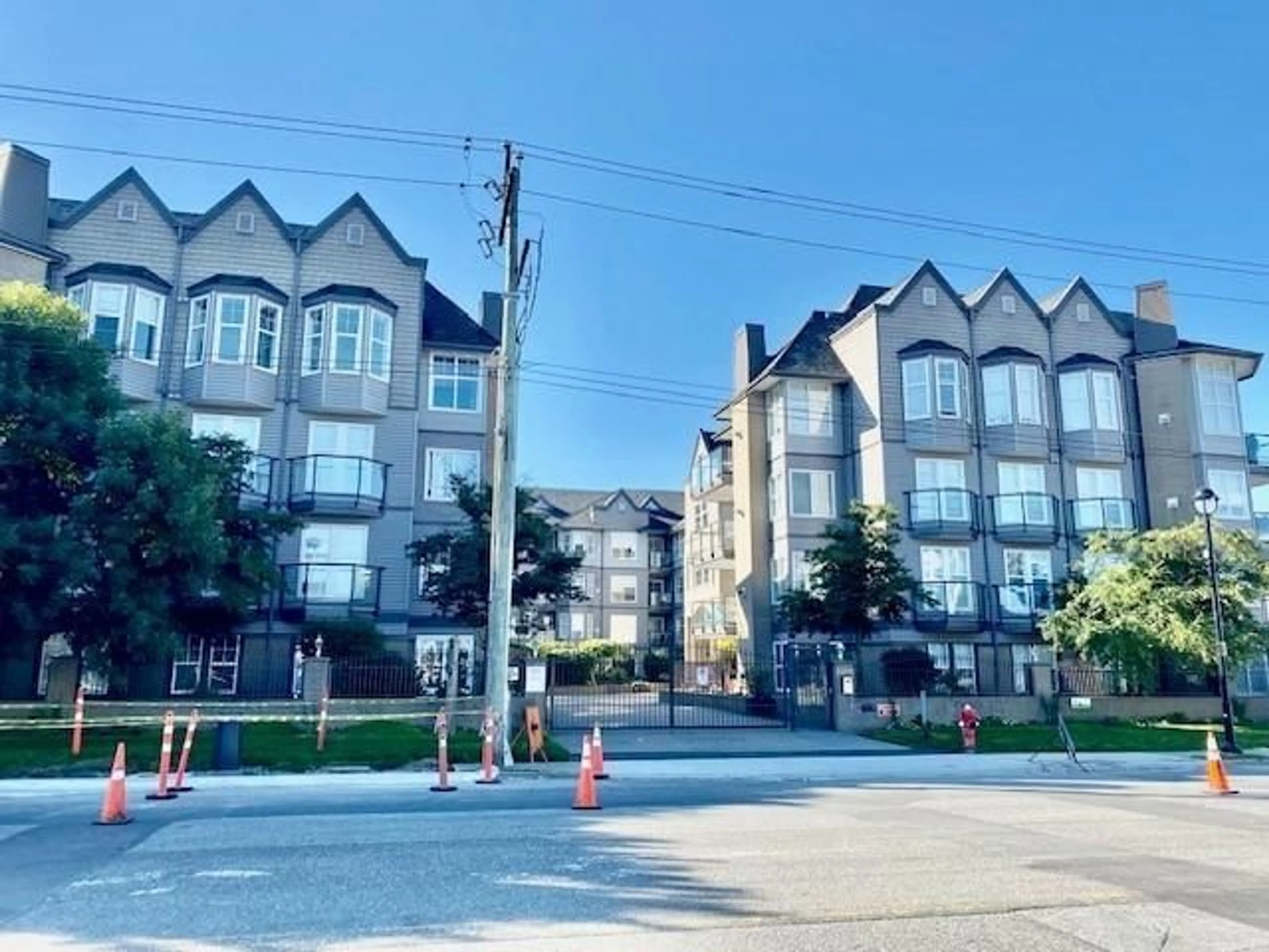 A pic from outside/outdoor area/front of a property/back of a property/a pic from drone, street for 301 - 20200 56 AVENUE, Langley British Columbia V3A8S1