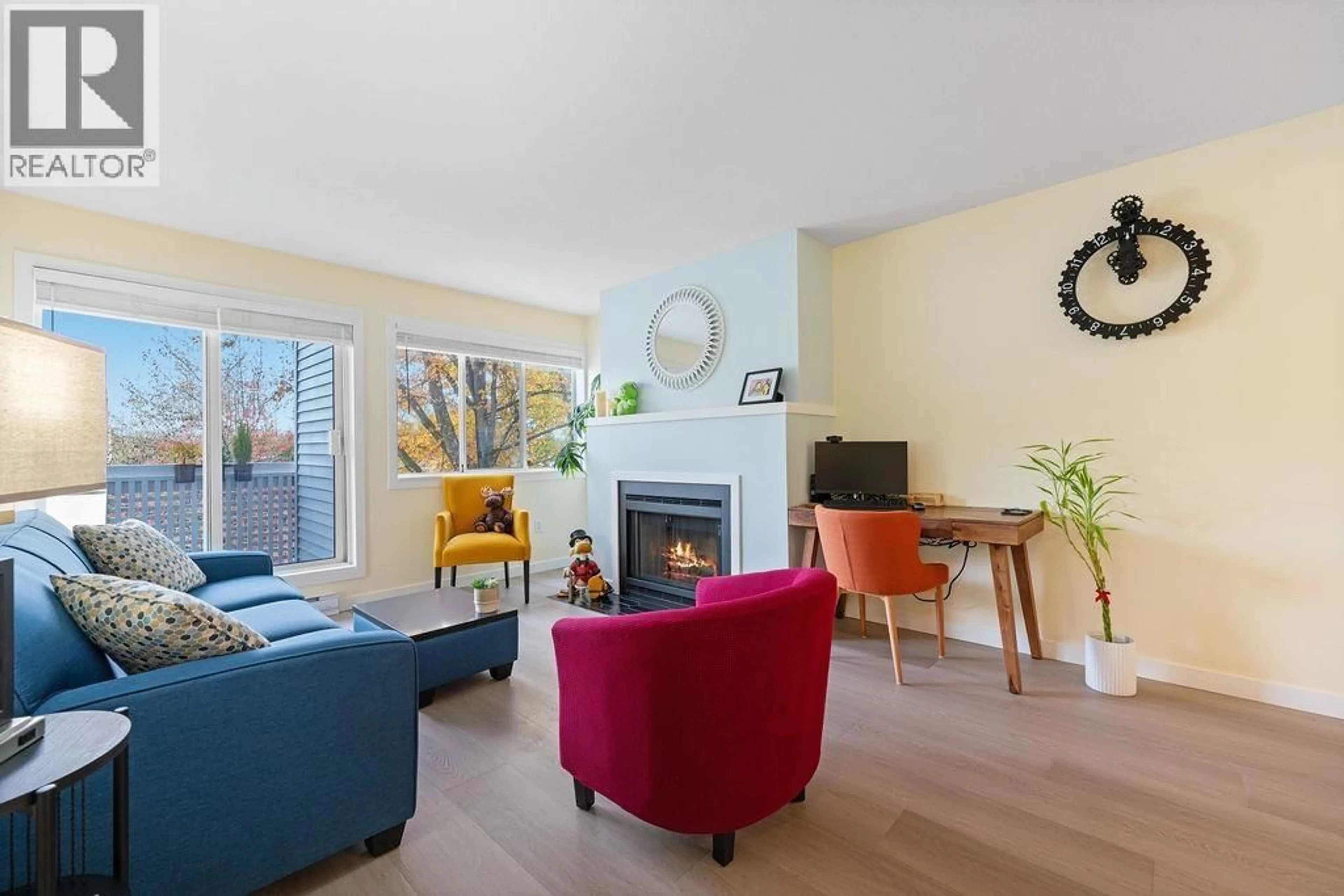 Living room with furniture, wood/laminate floor for 218 - 7751 MINORU BOULEVARD, Richmond British Columbia V6Y3G7