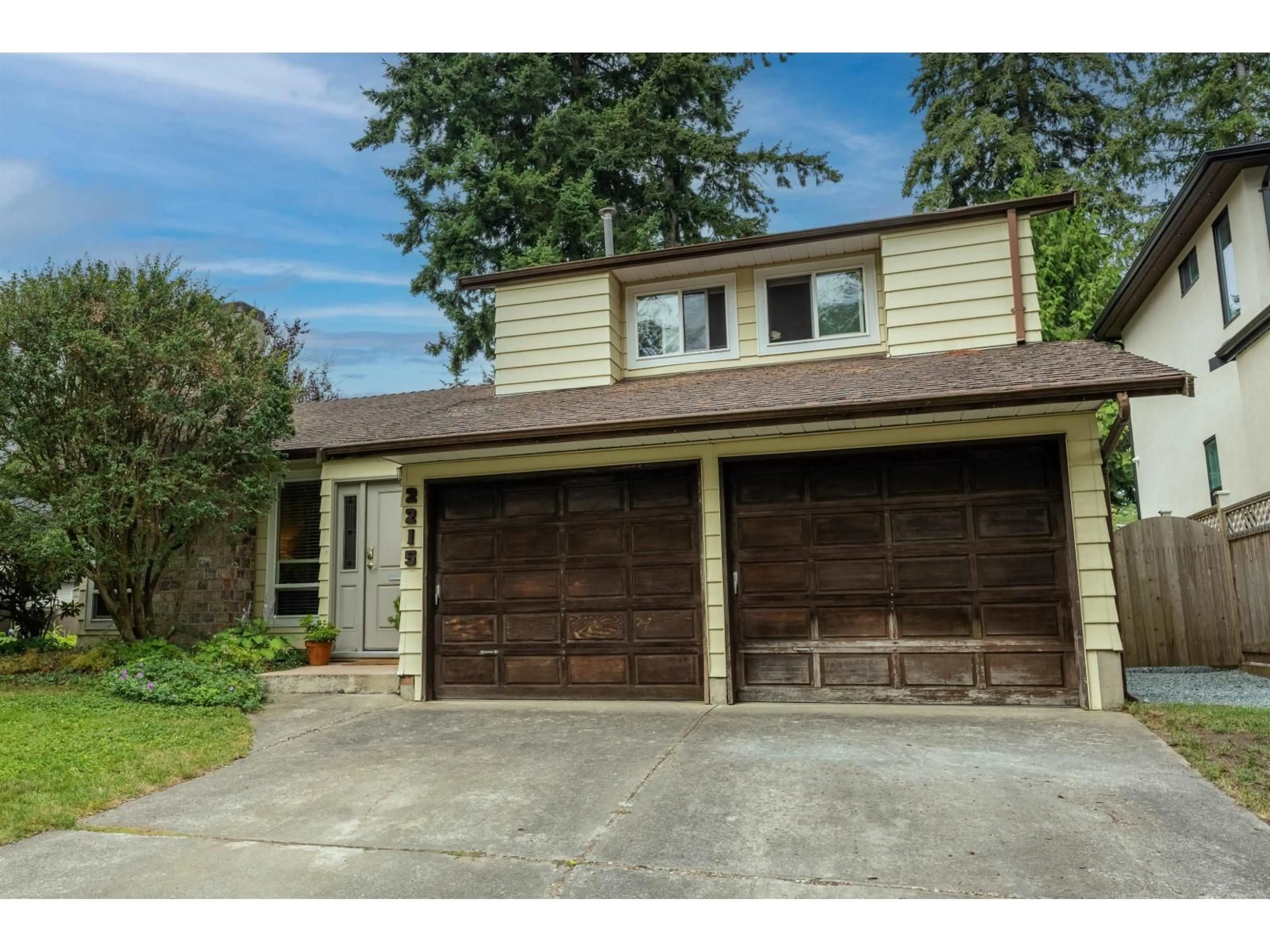 Home with vinyl exterior material, street for 2215 153A STREET, Surrey British Columbia V4A4R4