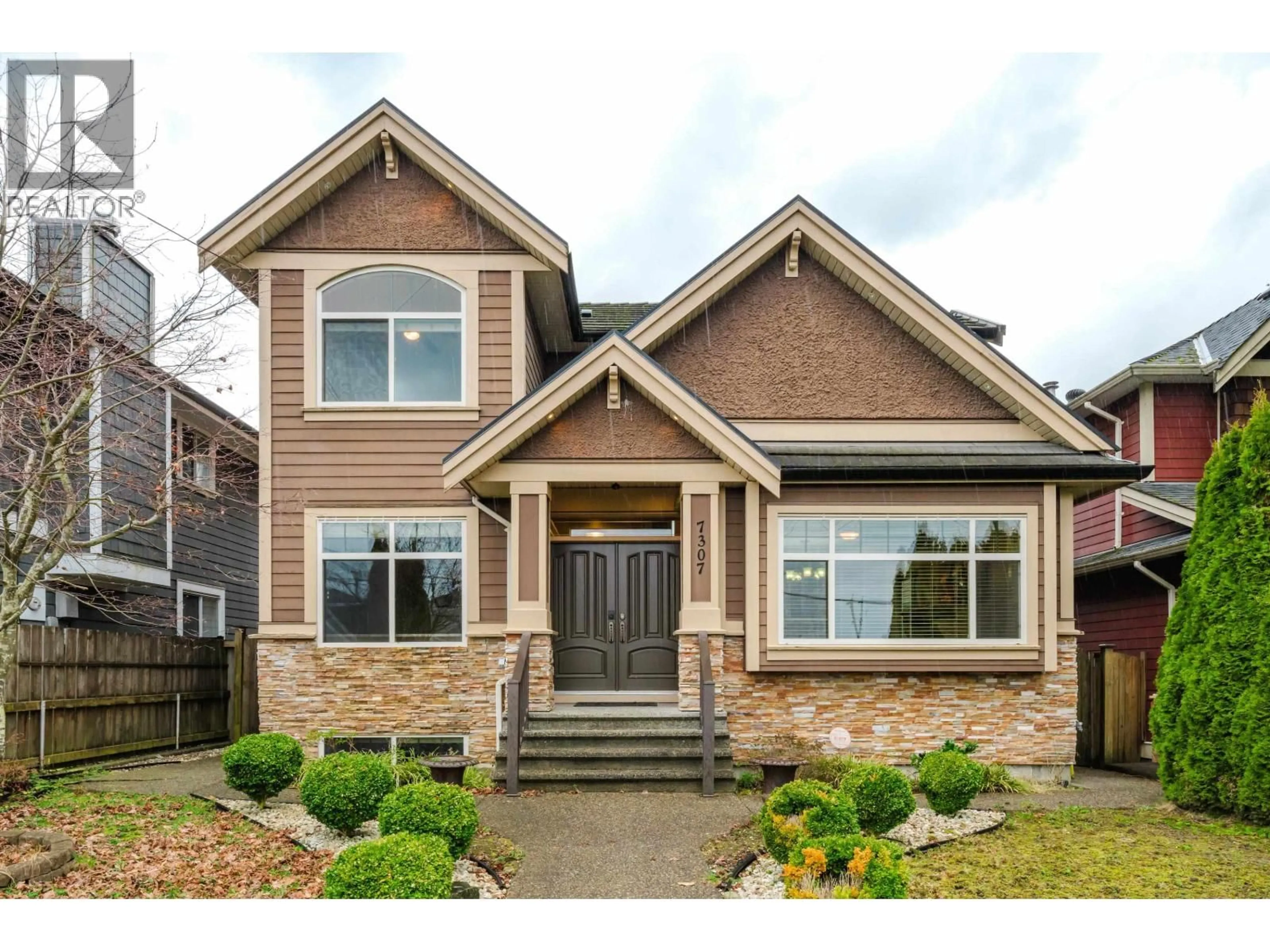 Home with brick exterior material, street for 7307 2ND STREET, Burnaby British Columbia V3N3P9