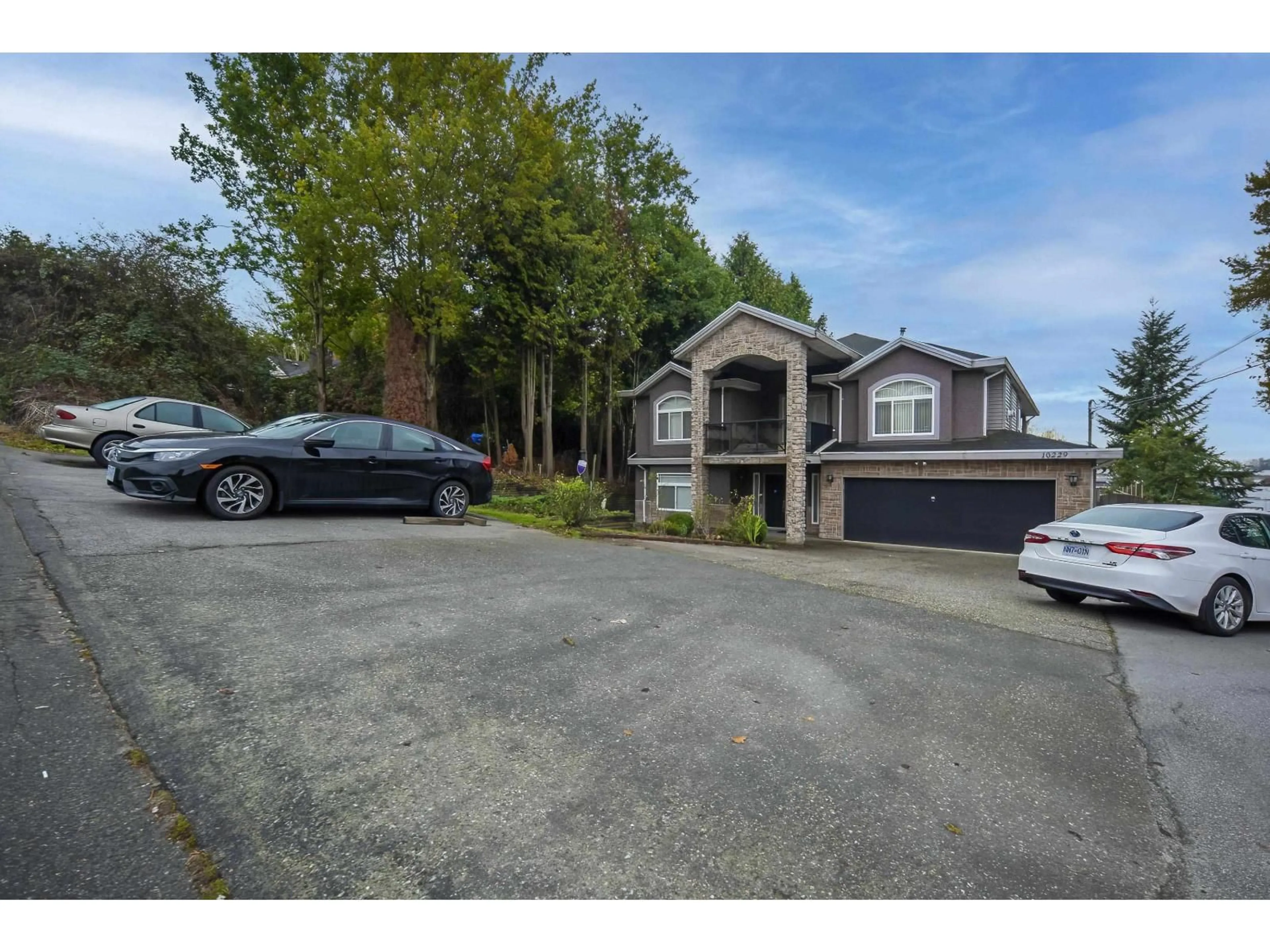 A pic from outside/outdoor area/front of a property/back of a property/a pic from drone, street for 10229 122 STREET, Surrey British Columbia V3V4N1