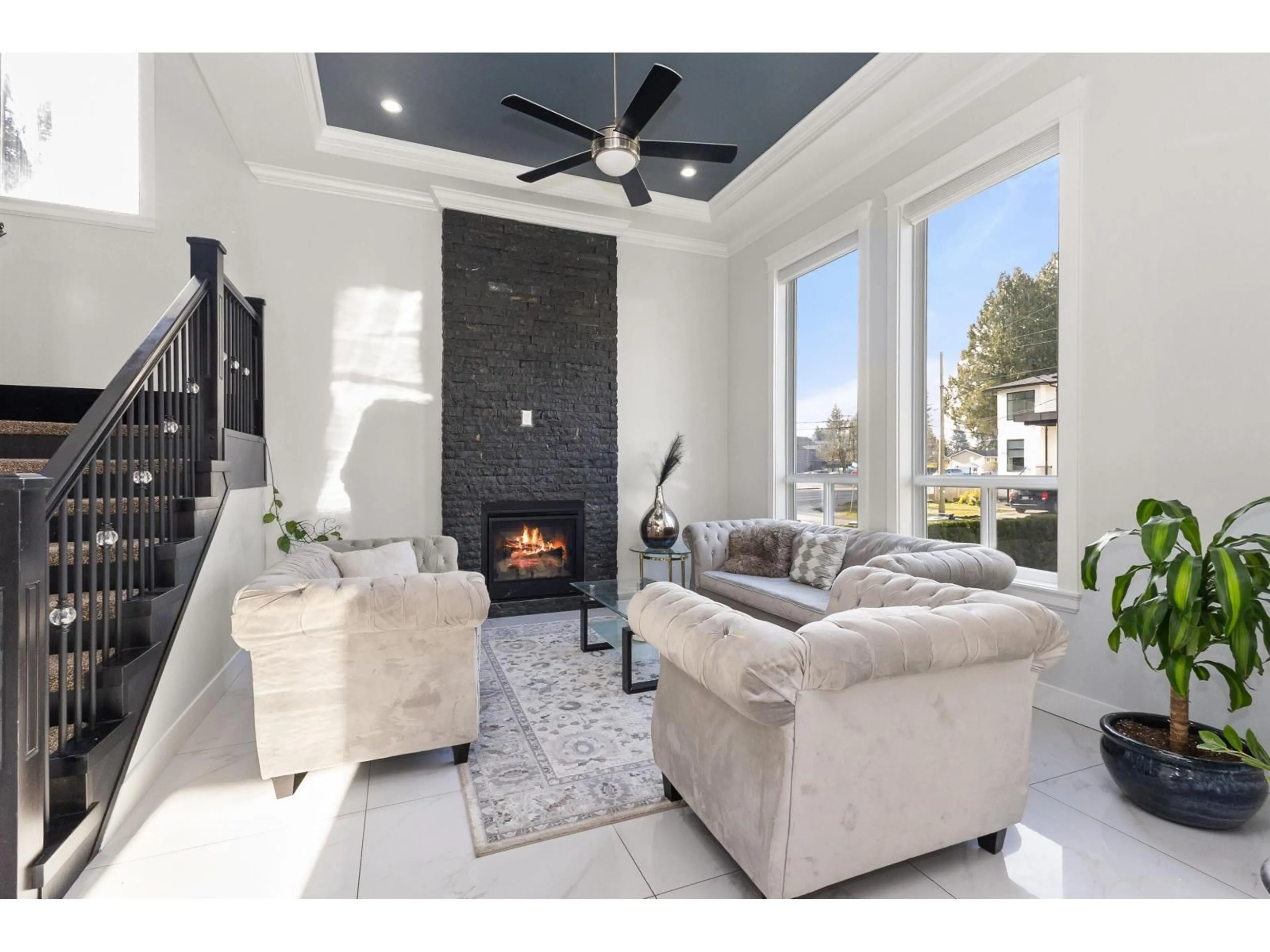 Living room with furniture, ceramic/tile floor for 2018 VINEWOOD STREET, Abbotsford British Columbia V2S3H2