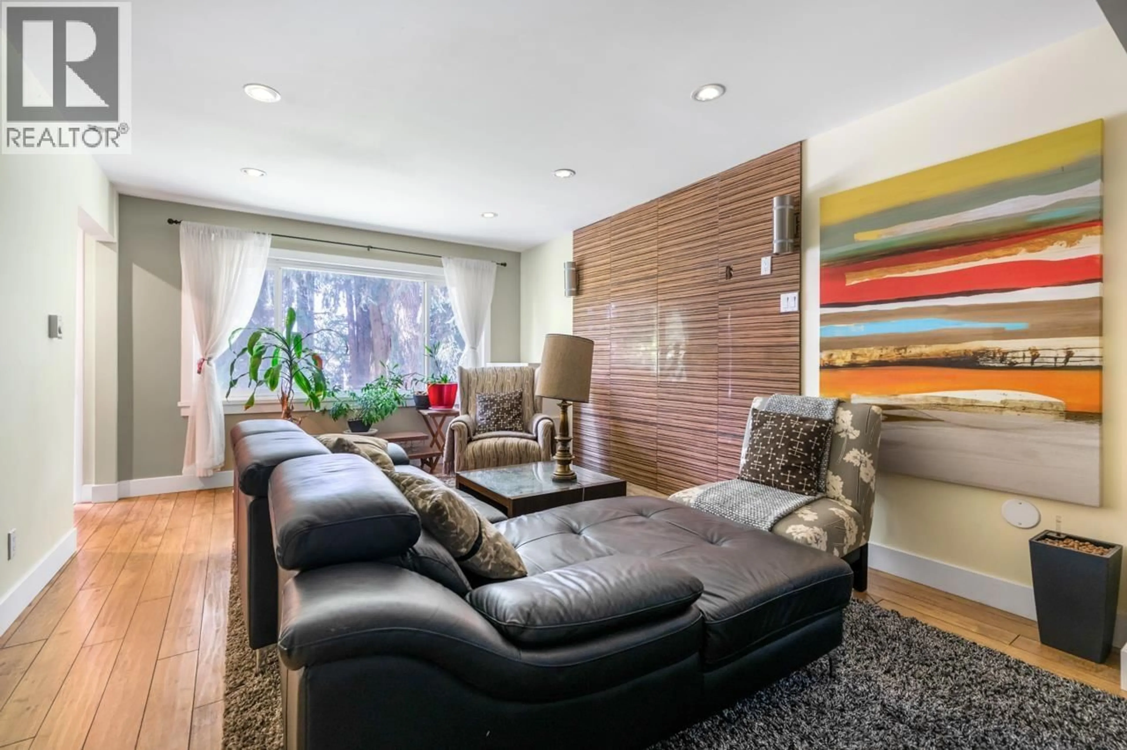 Living room with furniture, wood/laminate floor for 7814 ROSEWOOD STREET, Burnaby British Columbia V5E2H1