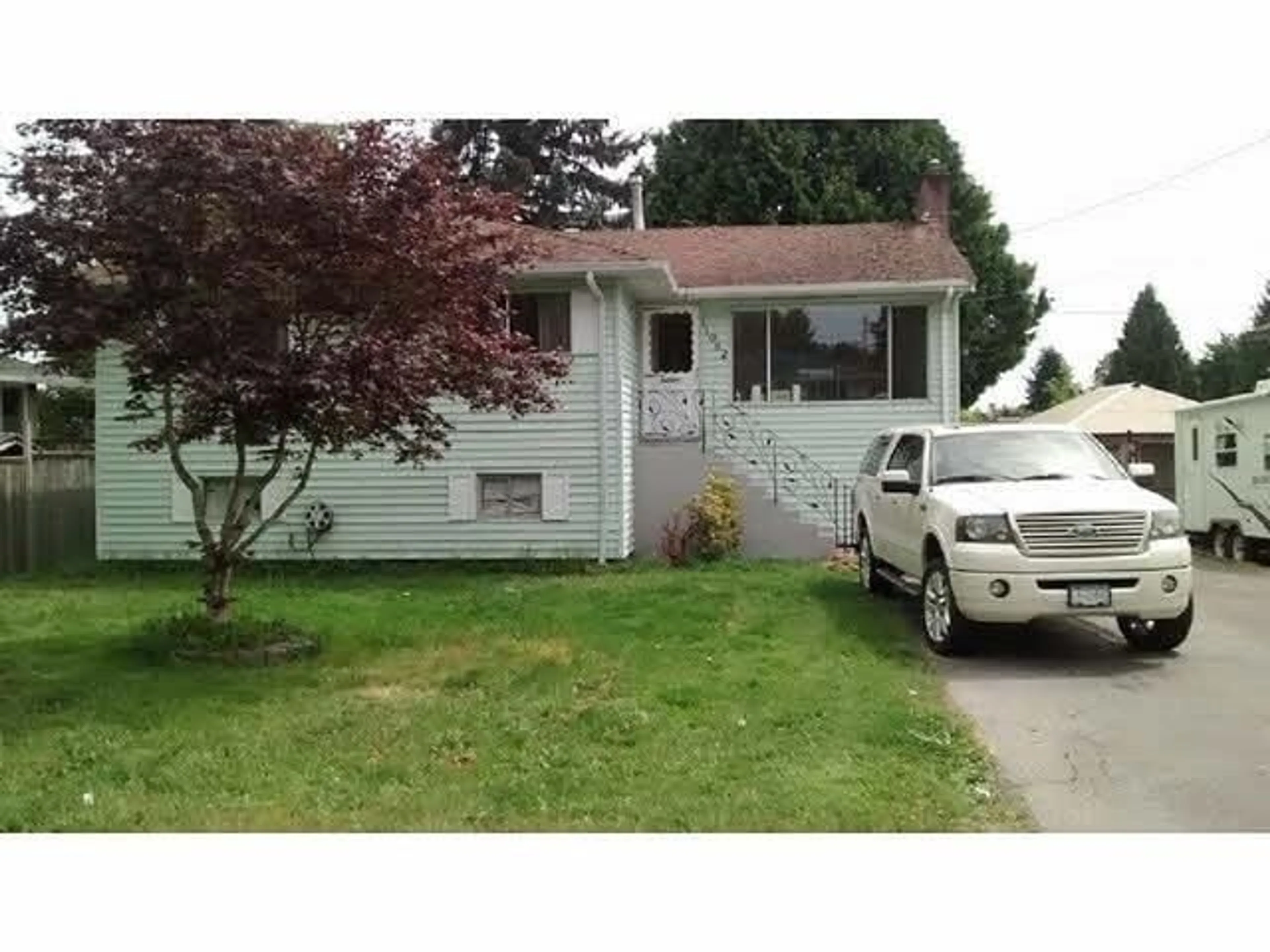 Home with vinyl exterior material, street for 11082 146A STREET, Surrey British Columbia V3R3V5