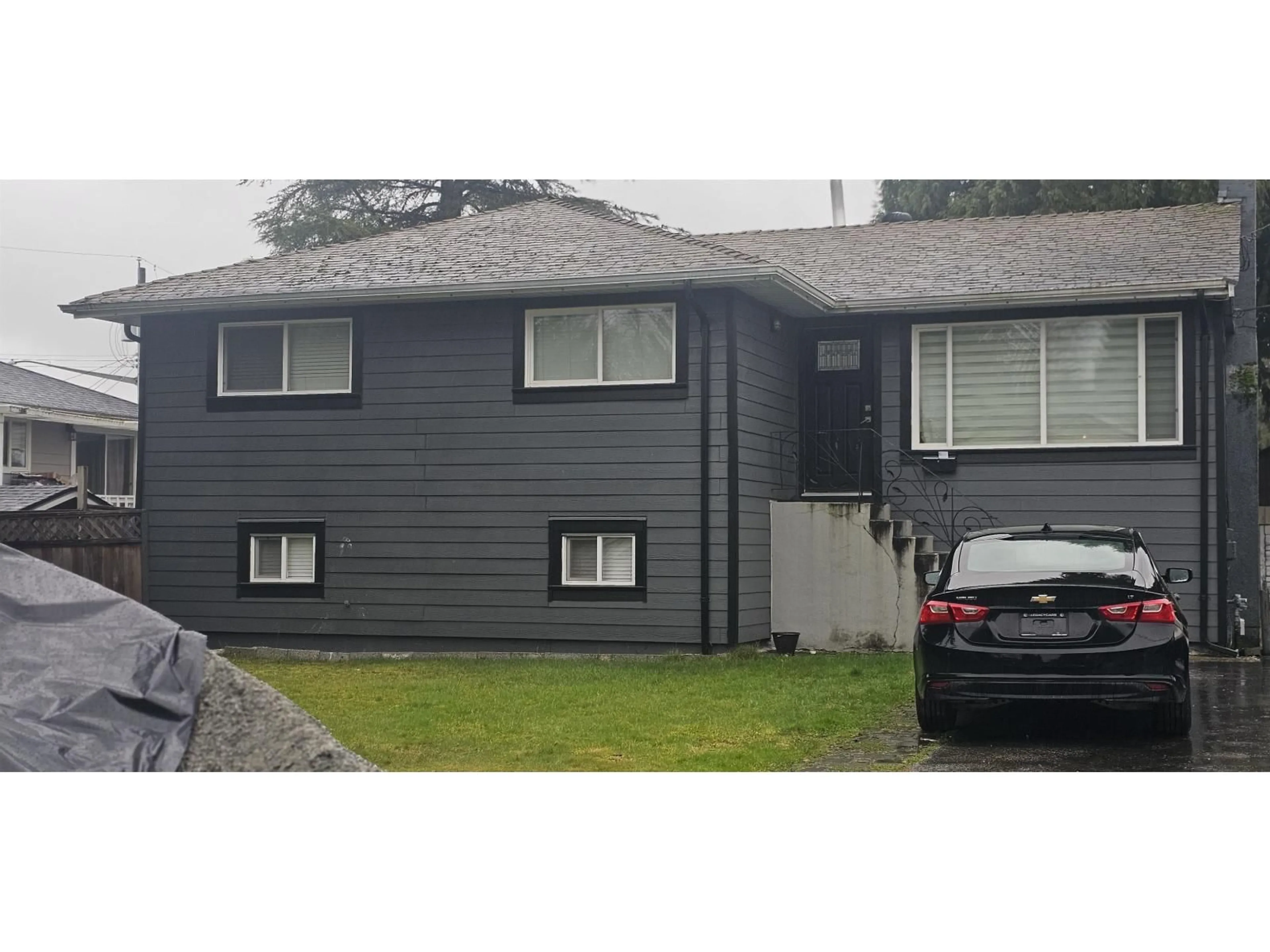 Home with vinyl exterior material, street for 11082 146A STREET, Surrey British Columbia V3R3V5