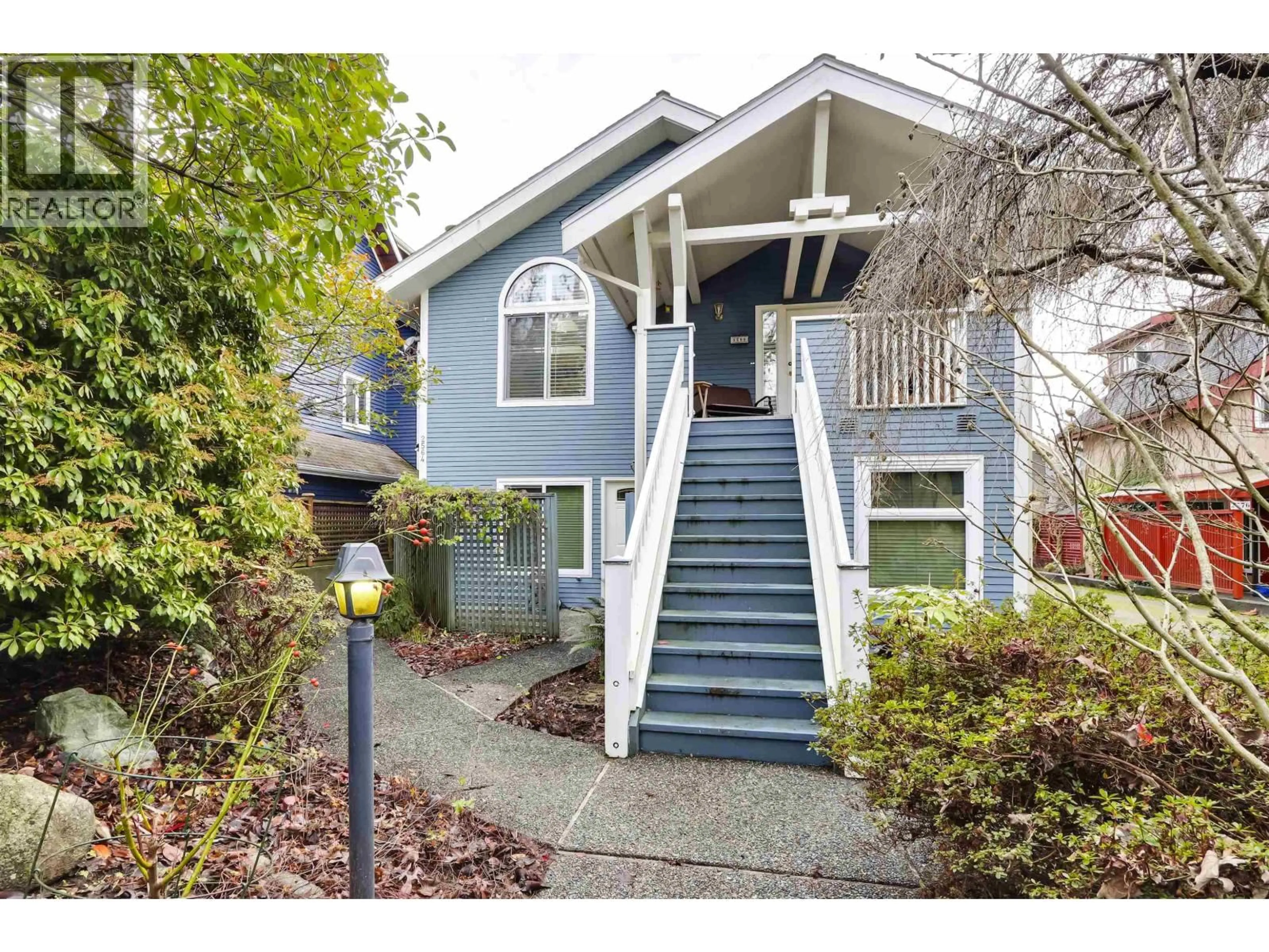 Home with vinyl exterior material, street for 2564 6TH AVENUE, Vancouver British Columbia V6K1W5