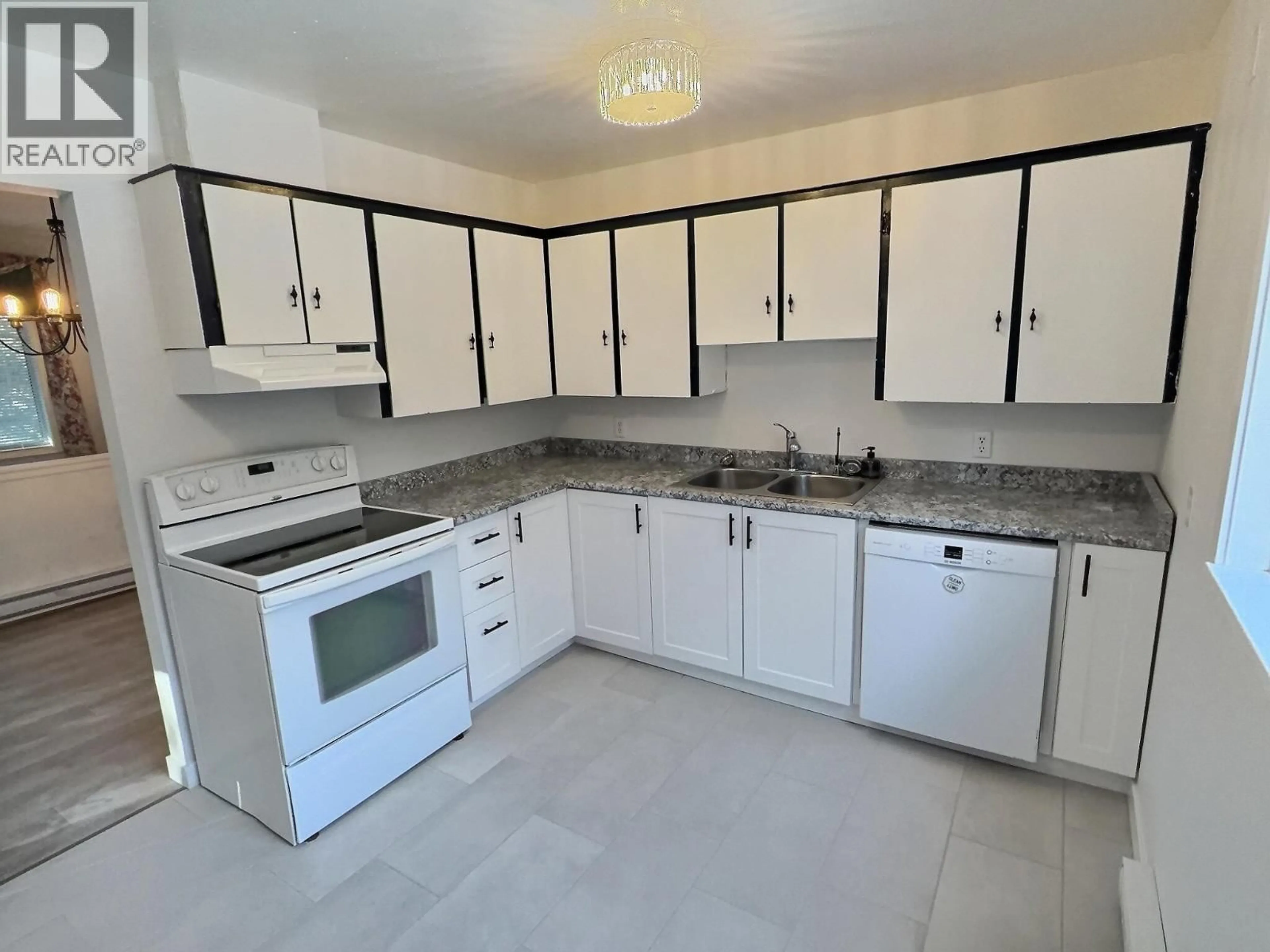 Standard kitchen, ceramic/tile floor for 5031 MEIN ROAD, 108 Mile Ranch British Columbia V0K2Z0