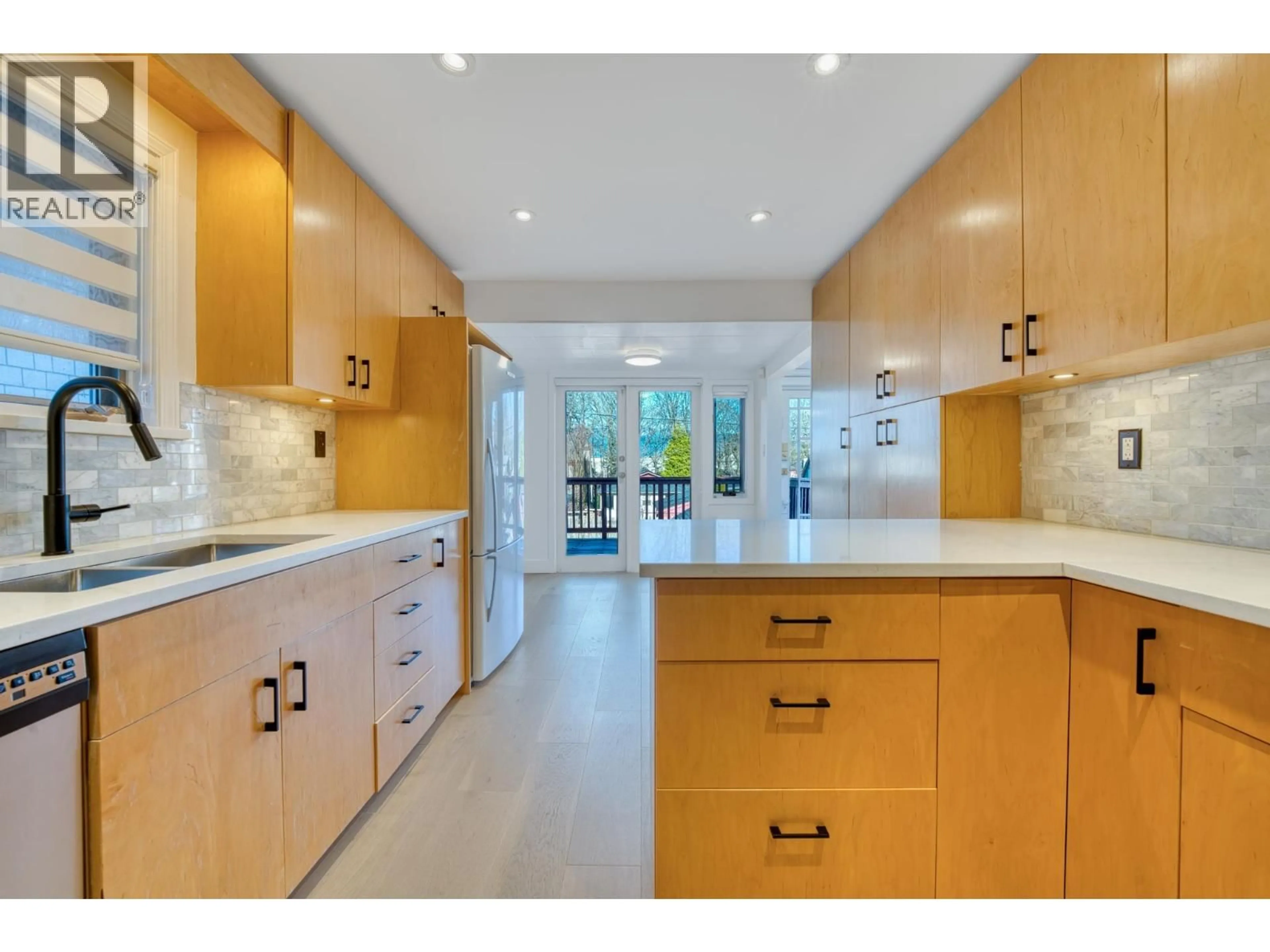 Open concept kitchen, ceramic/tile floor for 4377 12TH AVENUE, Vancouver British Columbia V6R2P9