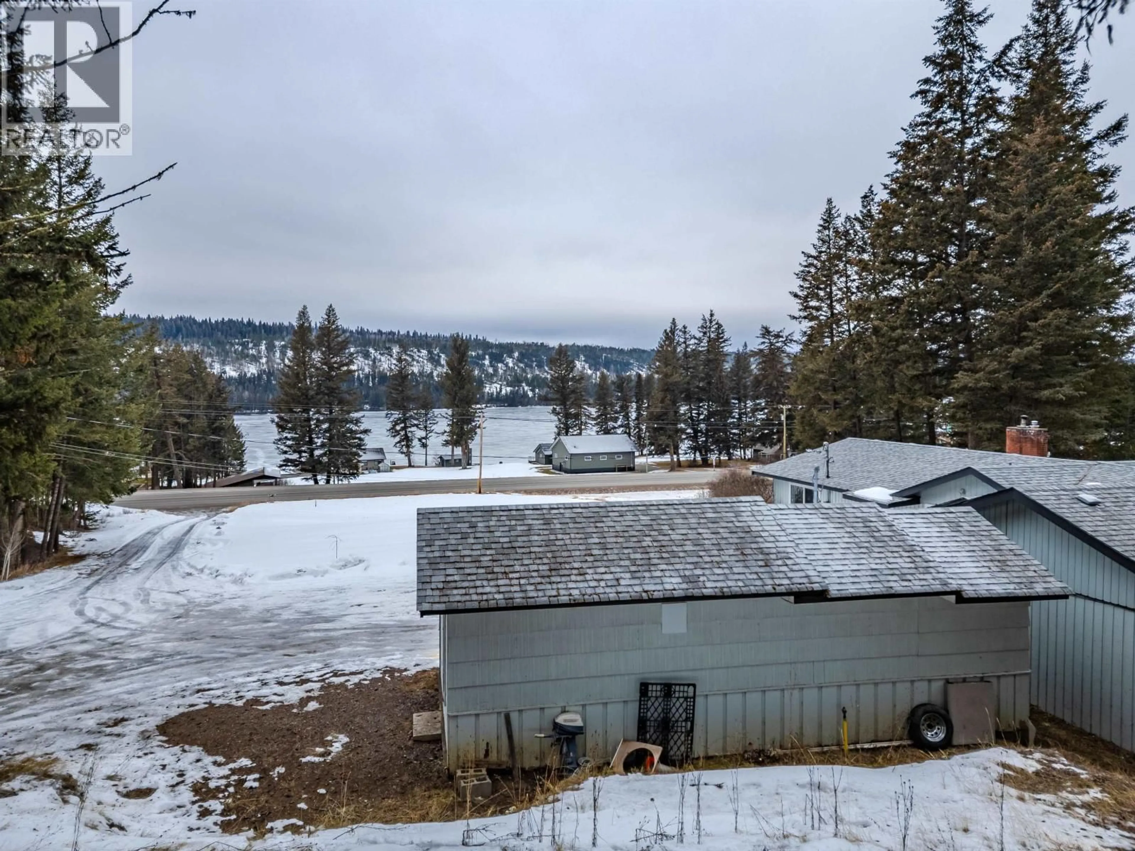 A pic from outside/outdoor area/front of a property/back of a property/a pic from drone, water/lake/river/ocean view for 3559 CARIBOO 97 HIGHWAY, Lac La Hache British Columbia V0K1T1
