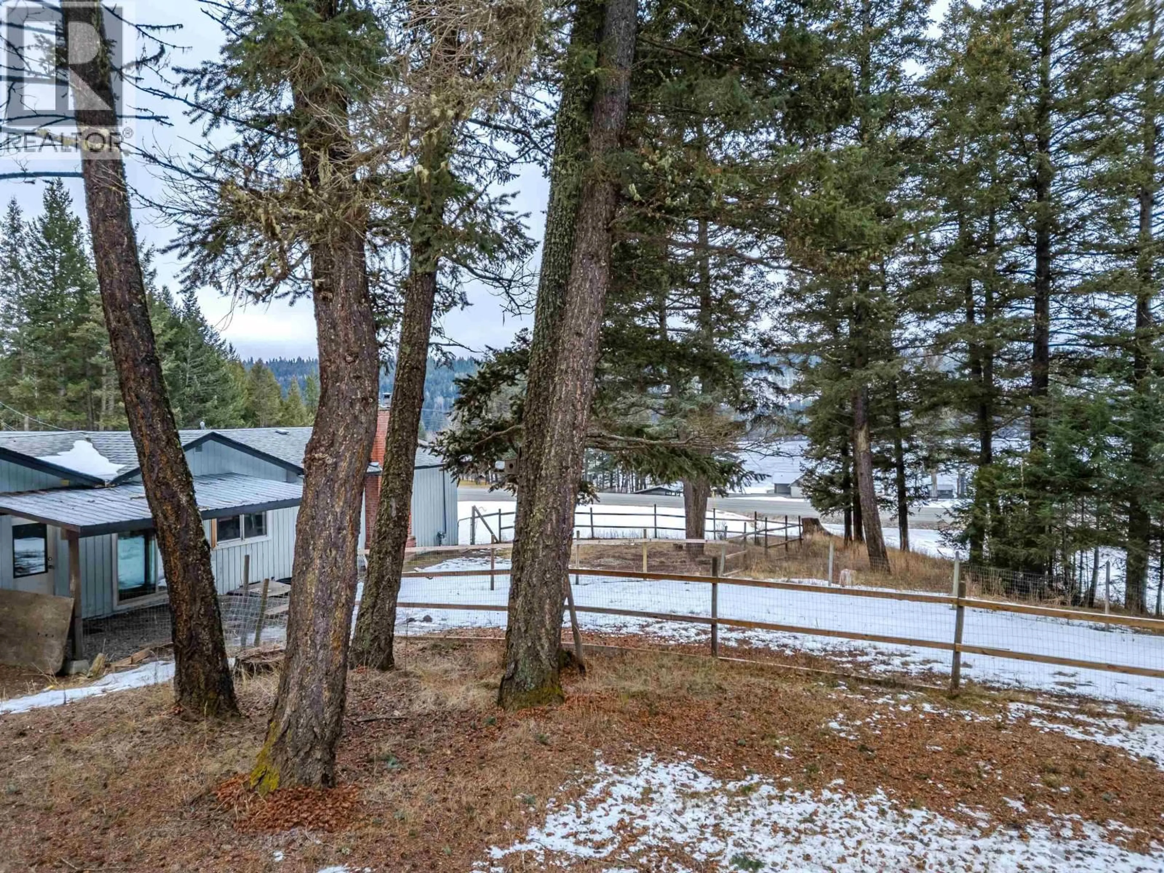 A pic from outside/outdoor area/front of a property/back of a property/a pic from drone, forest/trees view for 3559 CARIBOO 97 HIGHWAY, Lac La Hache British Columbia V0K1T1