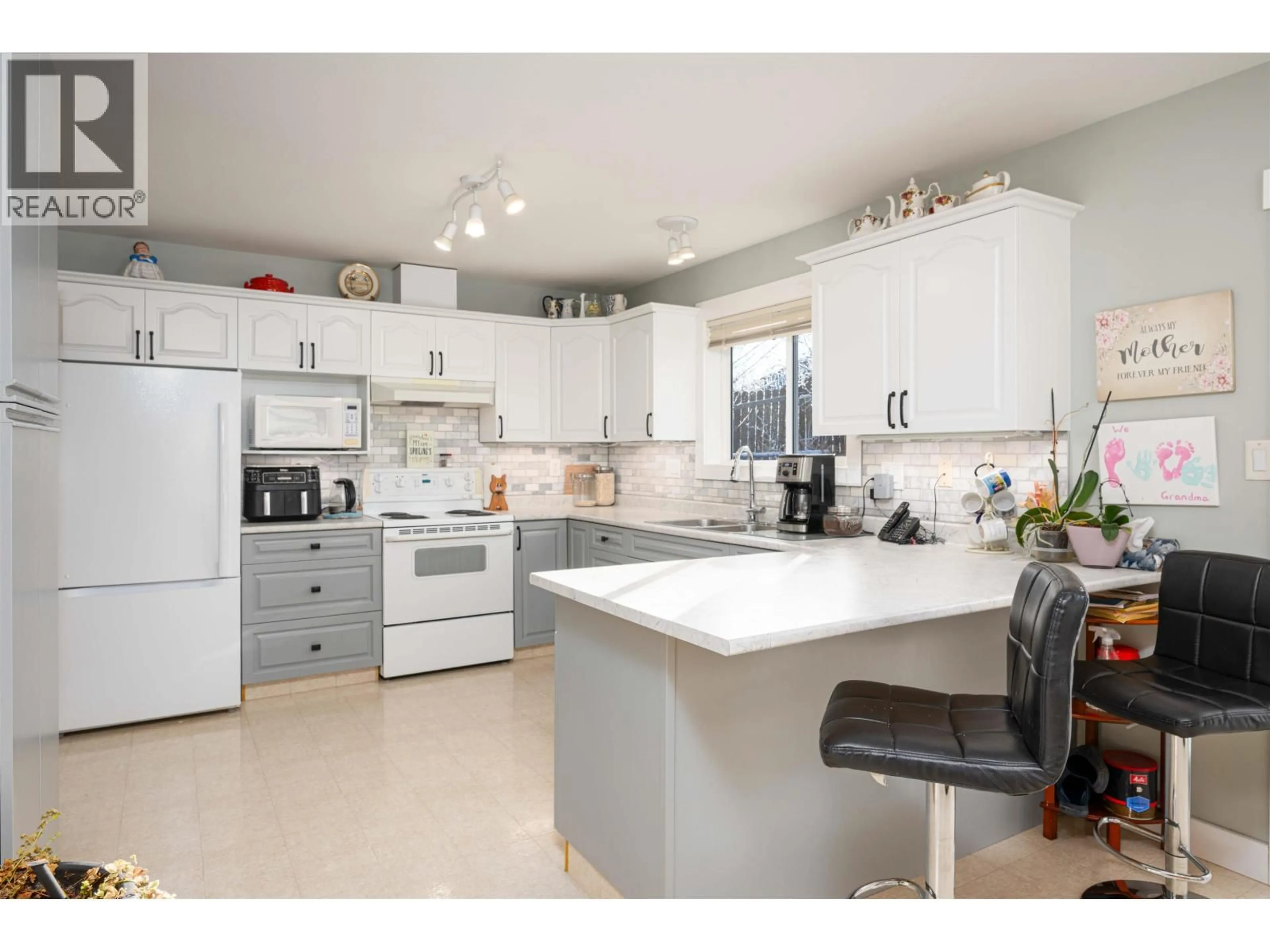 Open concept kitchen, ceramic/tile floor for 3053 VISTA RIDGE DRIVE, Prince George British Columbia V2N5G7