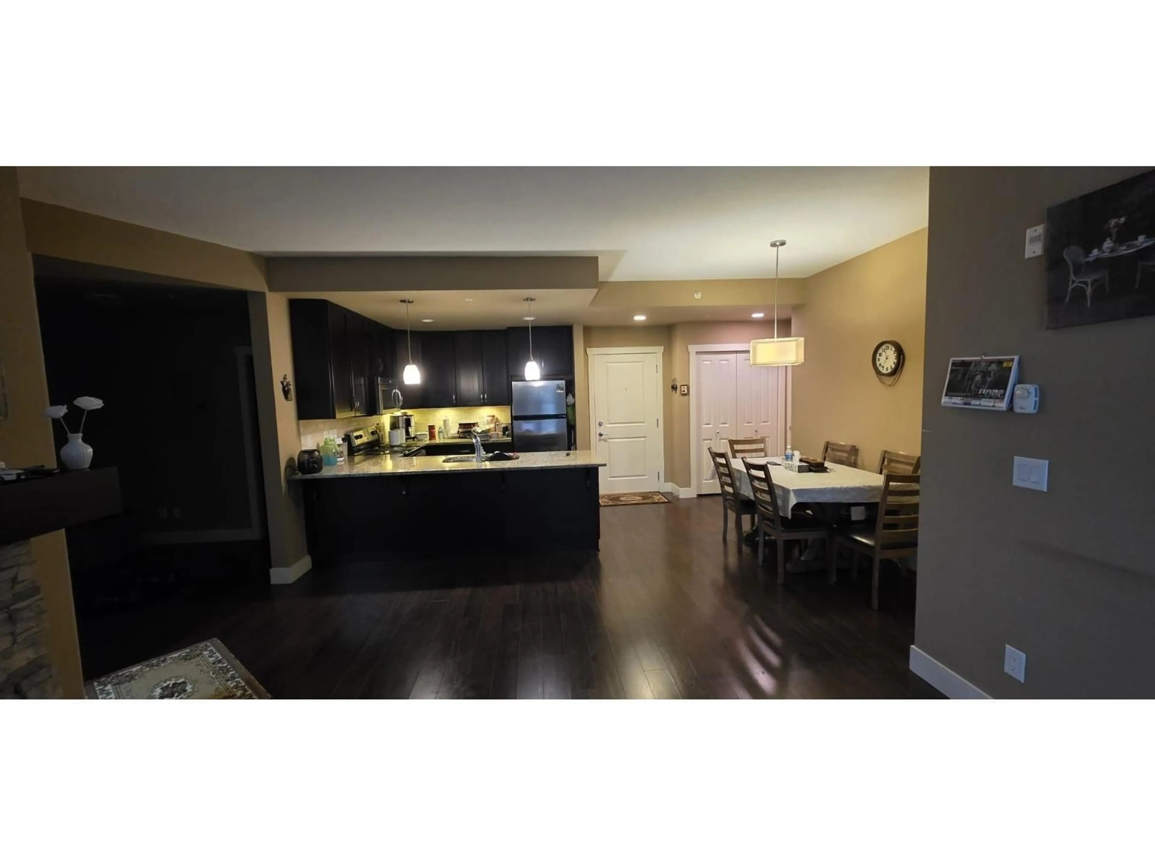 Open concept kitchen, wood/laminate floor for 316 - 3192 GLADWIN ROAD, Abbotsford British Columbia V2T6M9