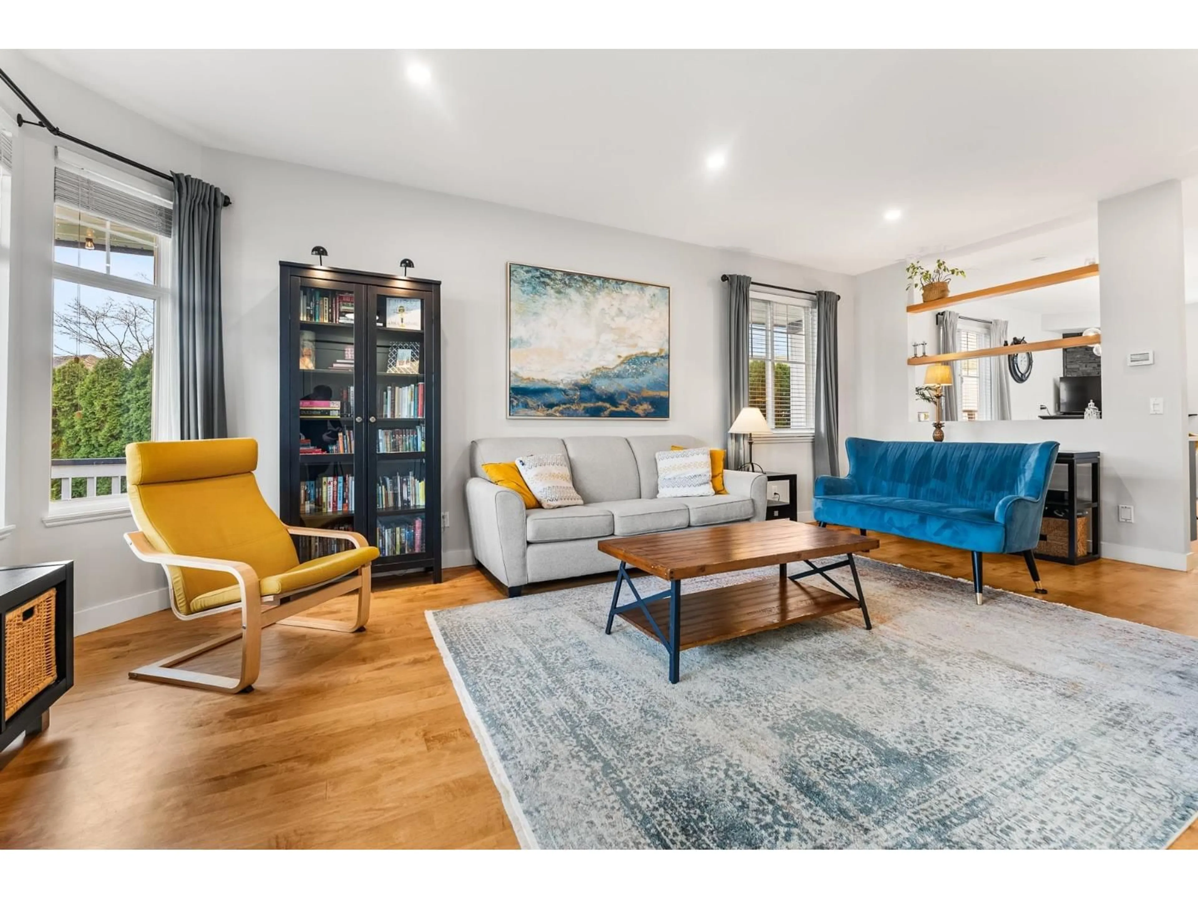 Living room with furniture, wood/laminate floor for 5665 149 STREET, Surrey British Columbia V3S8W9