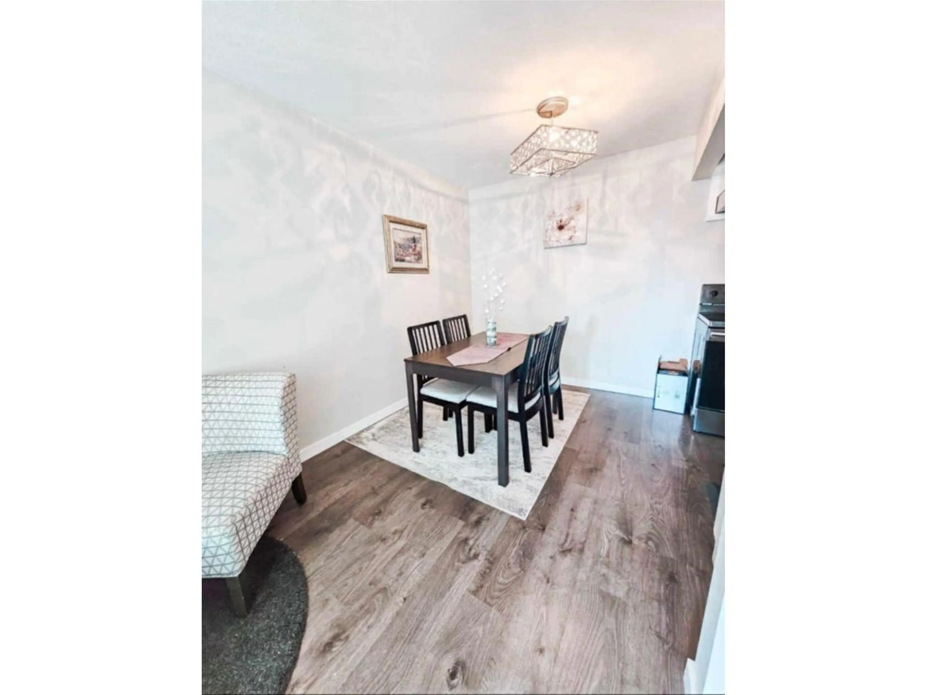 Dining room, wood/laminate floor for 206 - 10438 148 STREET, Surrey British Columbia V3R8S9