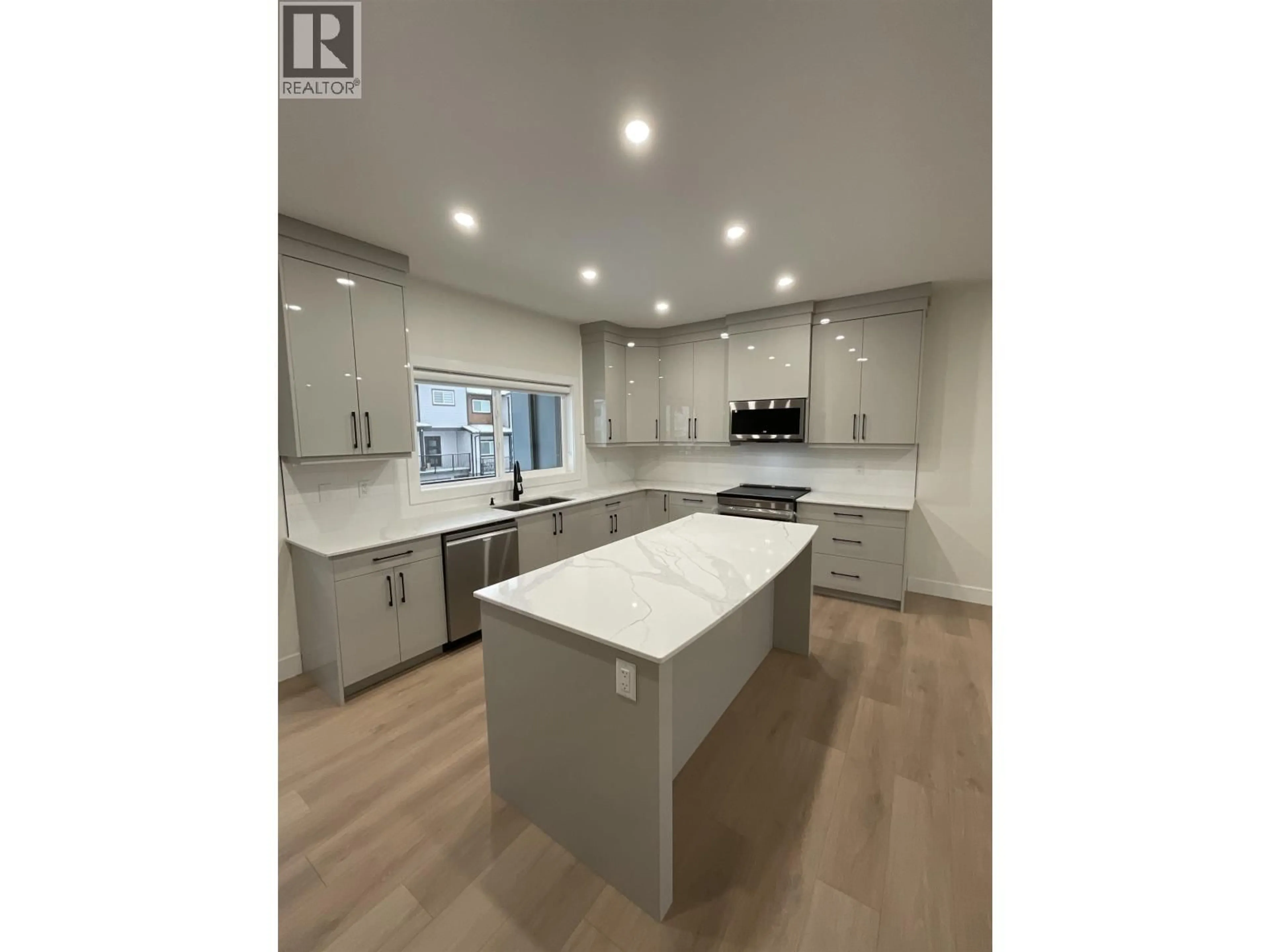 Open concept kitchen, unknown for 1302 - 2395 ROWE STREET, Prince George British Columbia V2N0K5