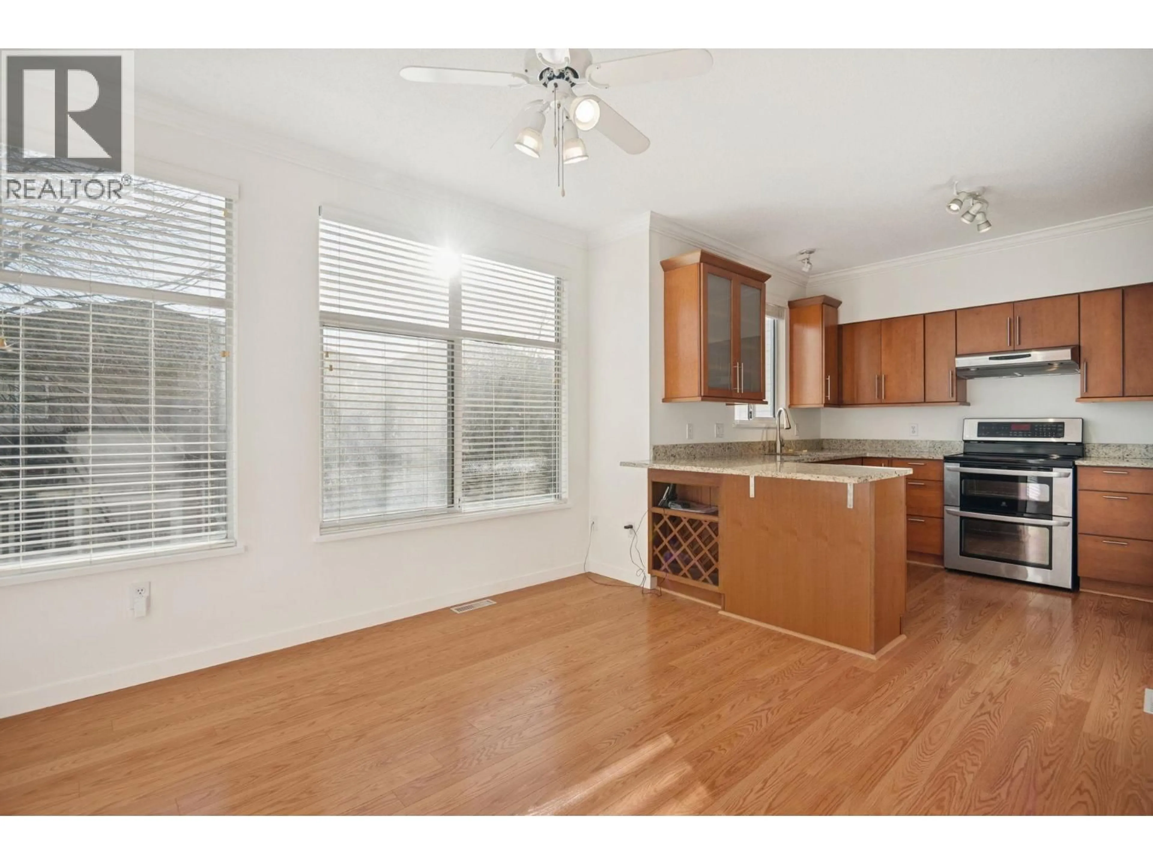 Open concept kitchen, wood/laminate floor for 9 - 12900 JACK BELL DRIVE, Richmond British Columbia V6V2V8