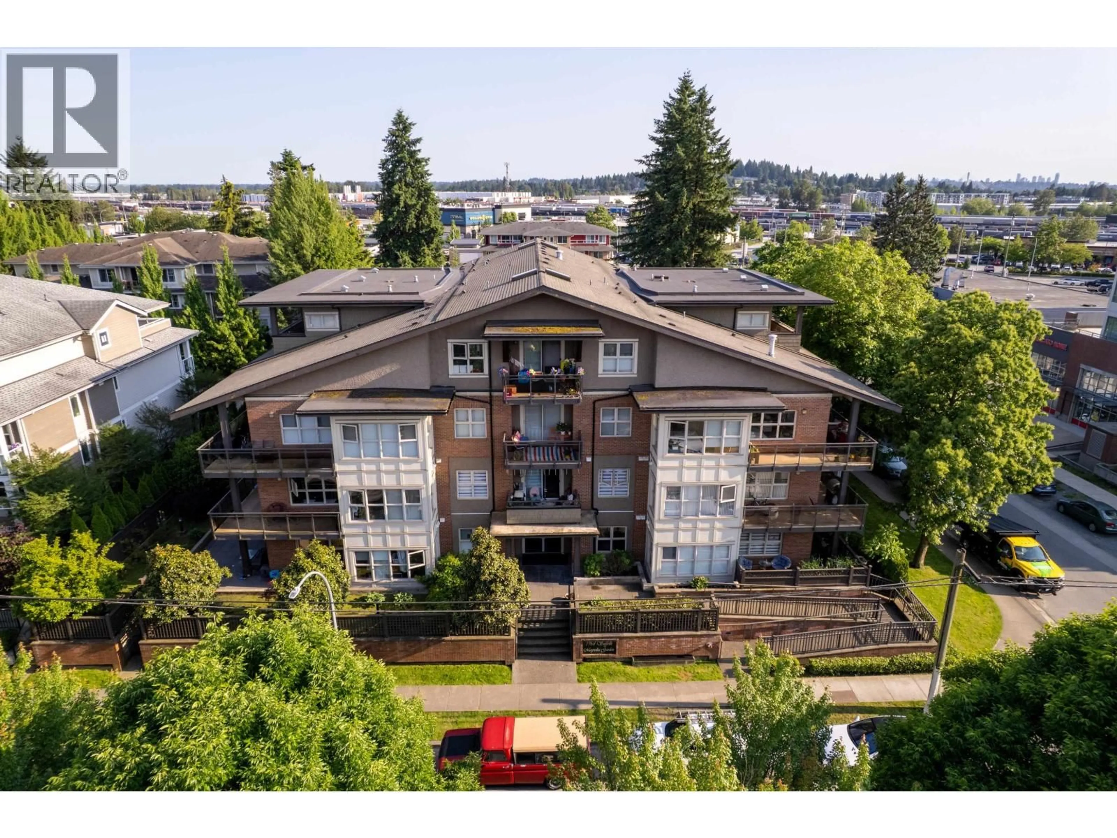 A pic from outside/outdoor area/front of a property/back of a property/a pic from drone, unknown for 103 - 1988 SUFFOLK AVENUE, Port Coquitlam British Columbia V3B1H2