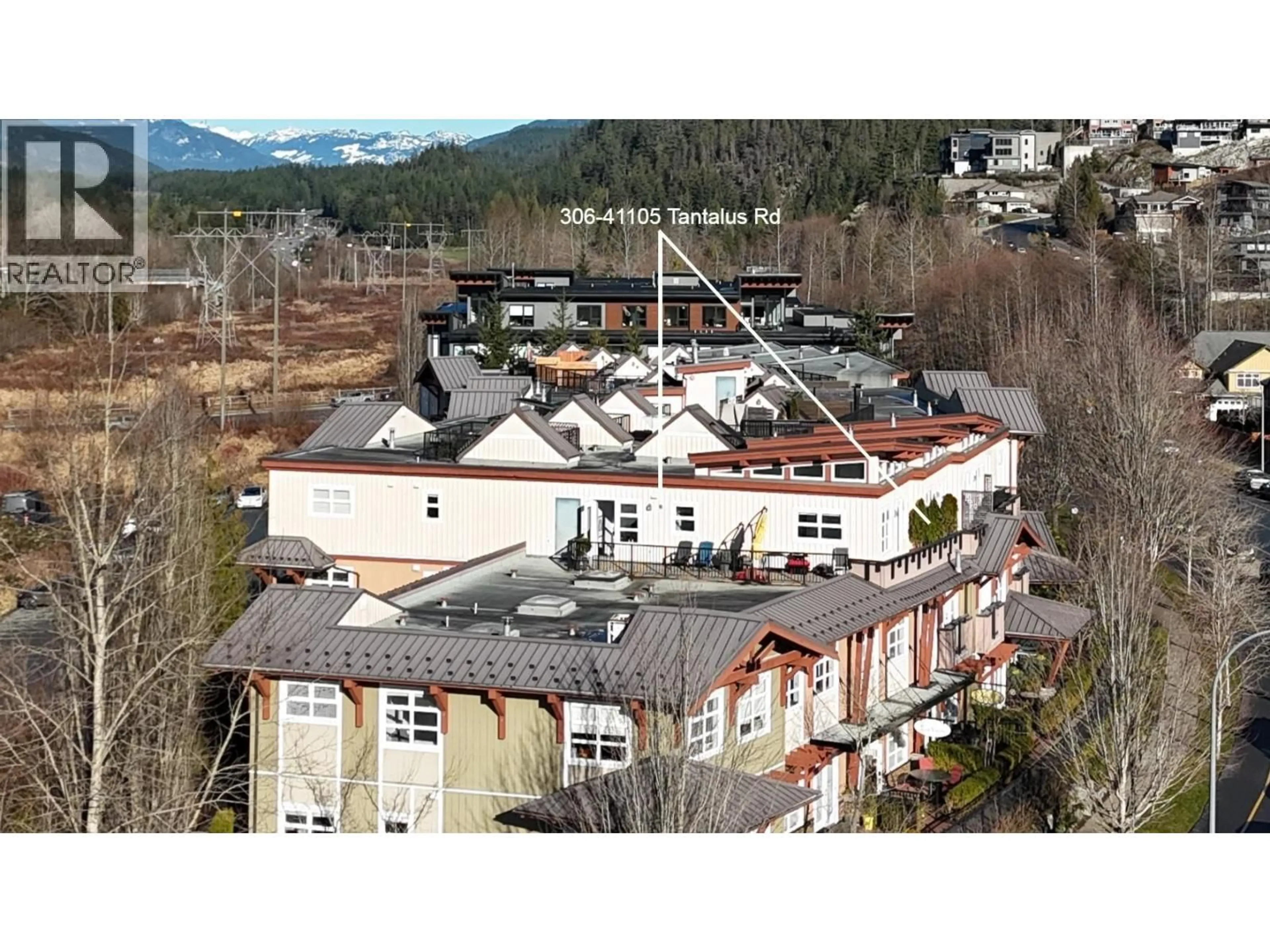 A pic from outside/outdoor area/front of a property/back of a property/a pic from drone, unknown for 306 - 41105 TANTALUS ROAD, Squamish British Columbia V8B0N3