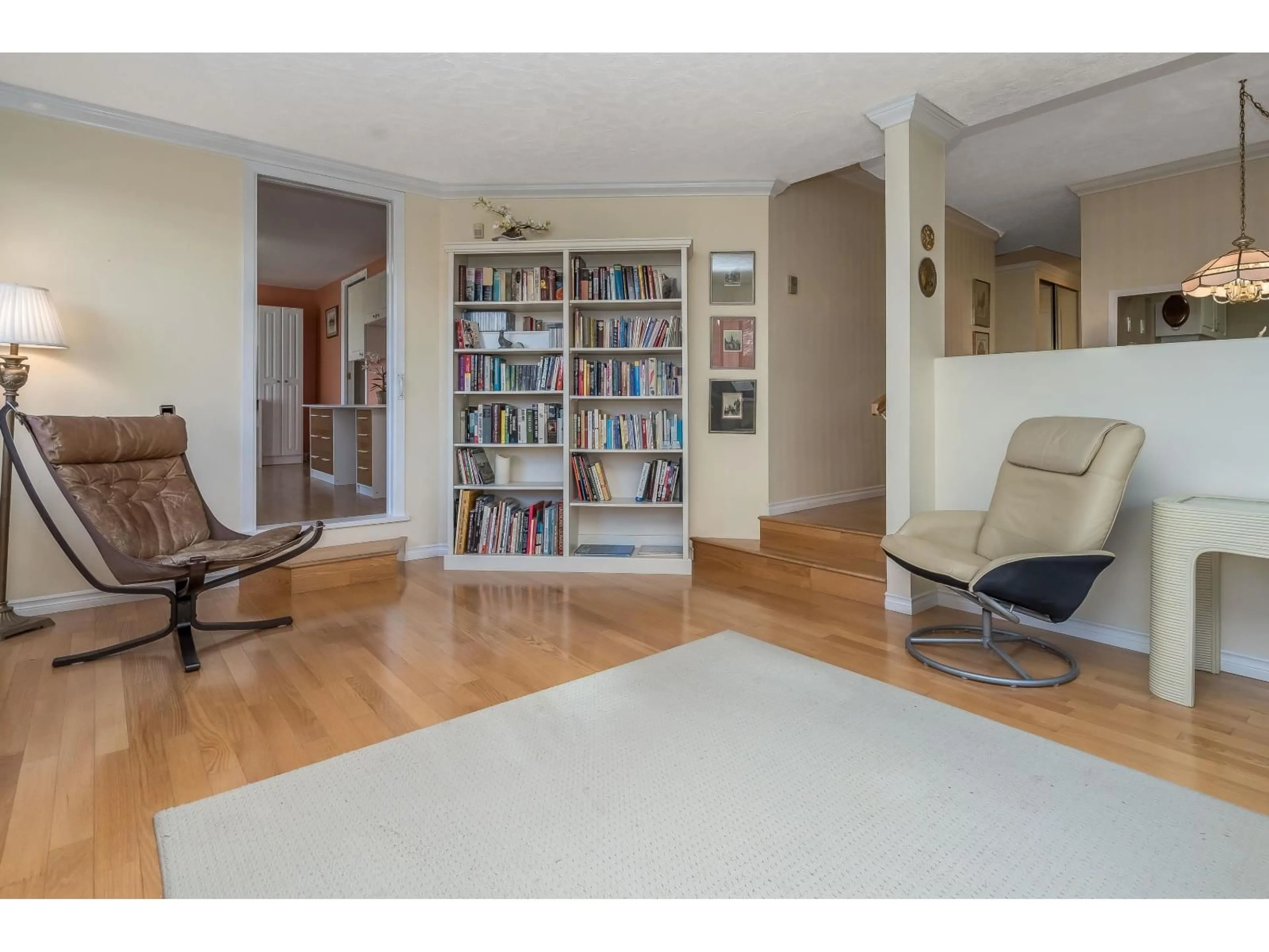 Living room with furniture, wood/laminate floor for 112 - 15275 19 AVENUE, Surrey British Columbia V4A1X6