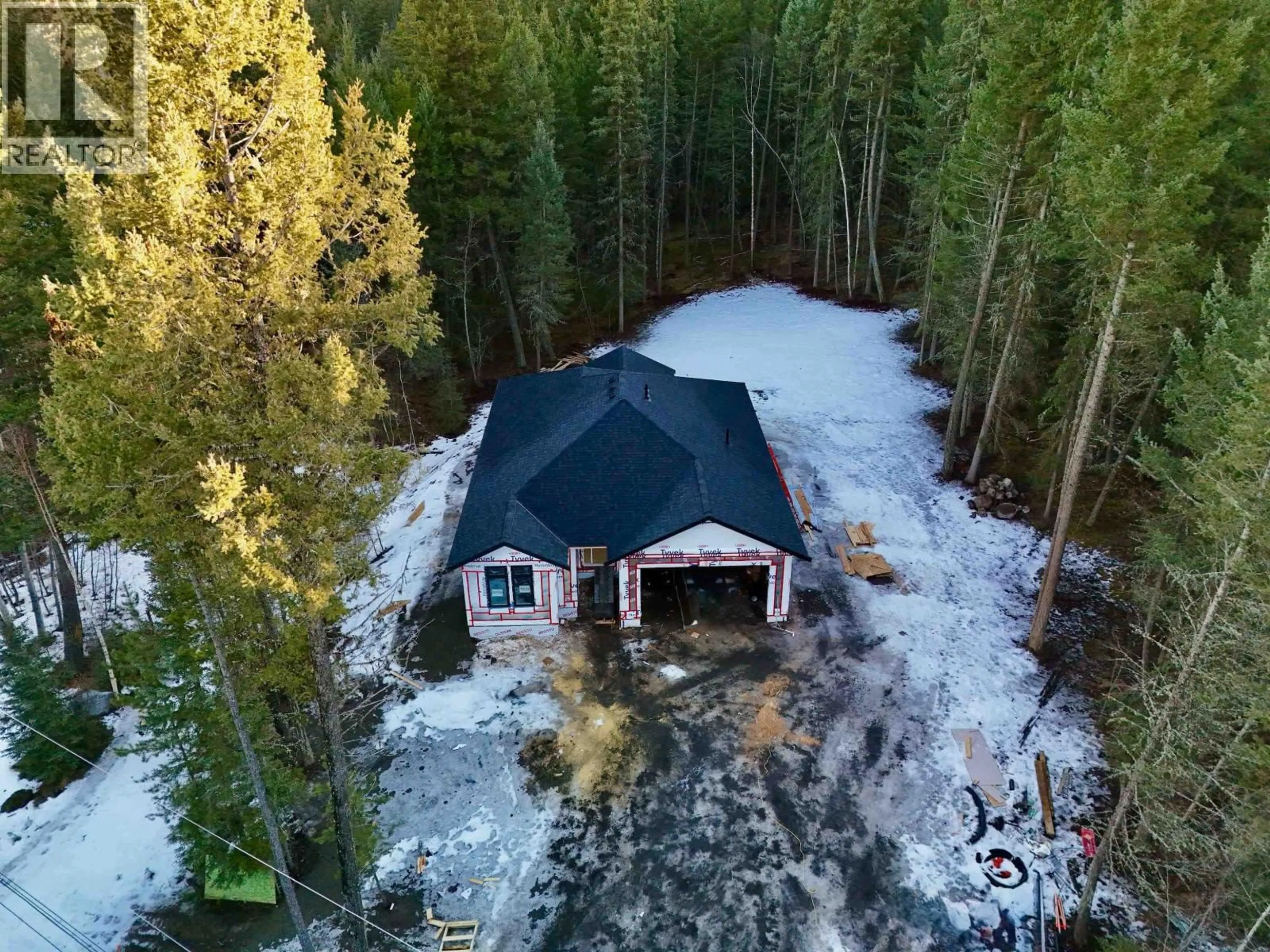 A pic from outside/outdoor area/front of a property/back of a property/a pic from drone, water/lake/river/ocean view for 5336 THOMPSON ROAD, 108 Mile Ranch British Columbia V0K2Z0