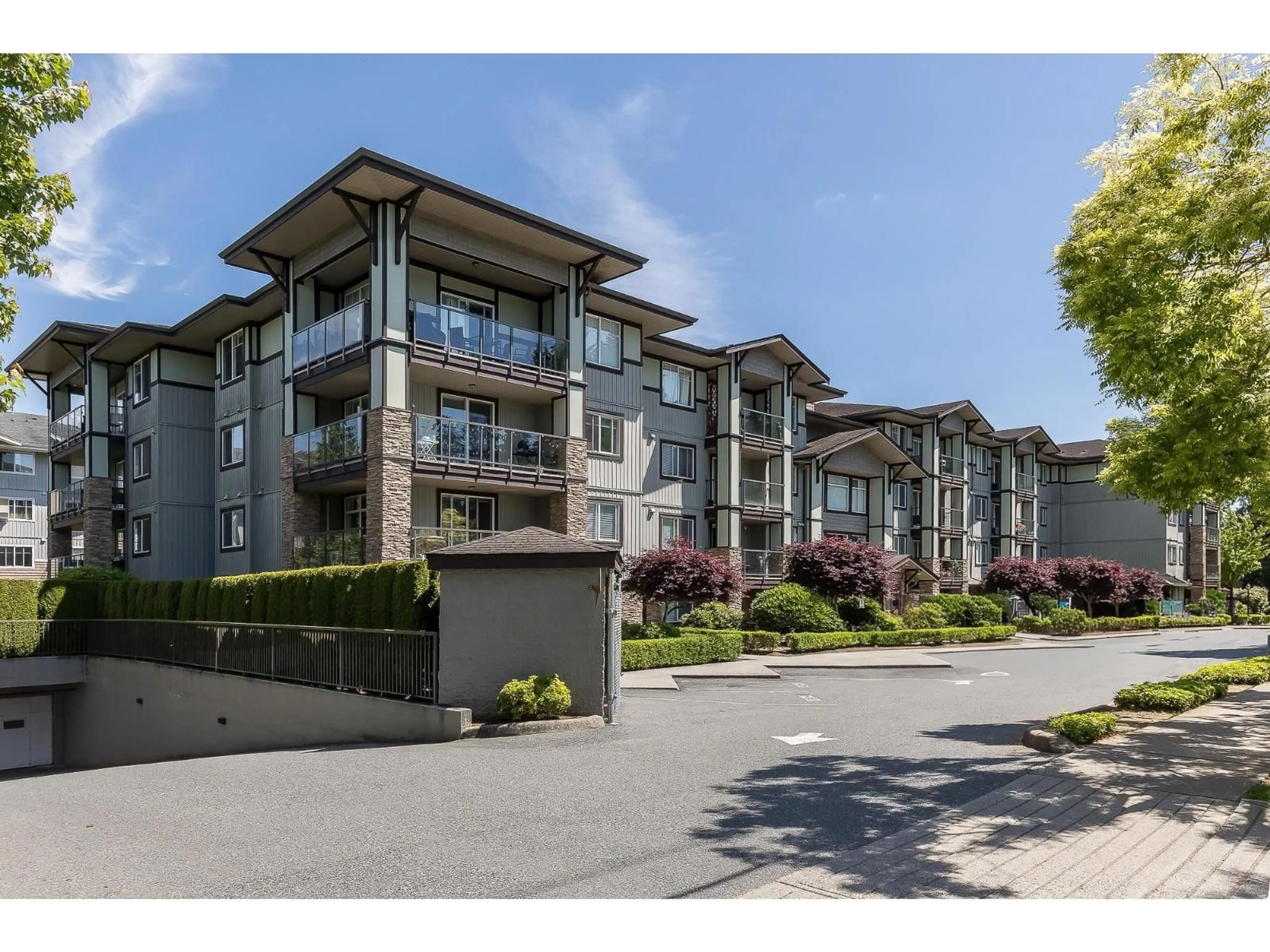 A pic from outside/outdoor area/front of a property/back of a property/a pic from drone, street for 204 - 2038 SANDALWOOD CRESCENT, Abbotsford British Columbia V2S3H6