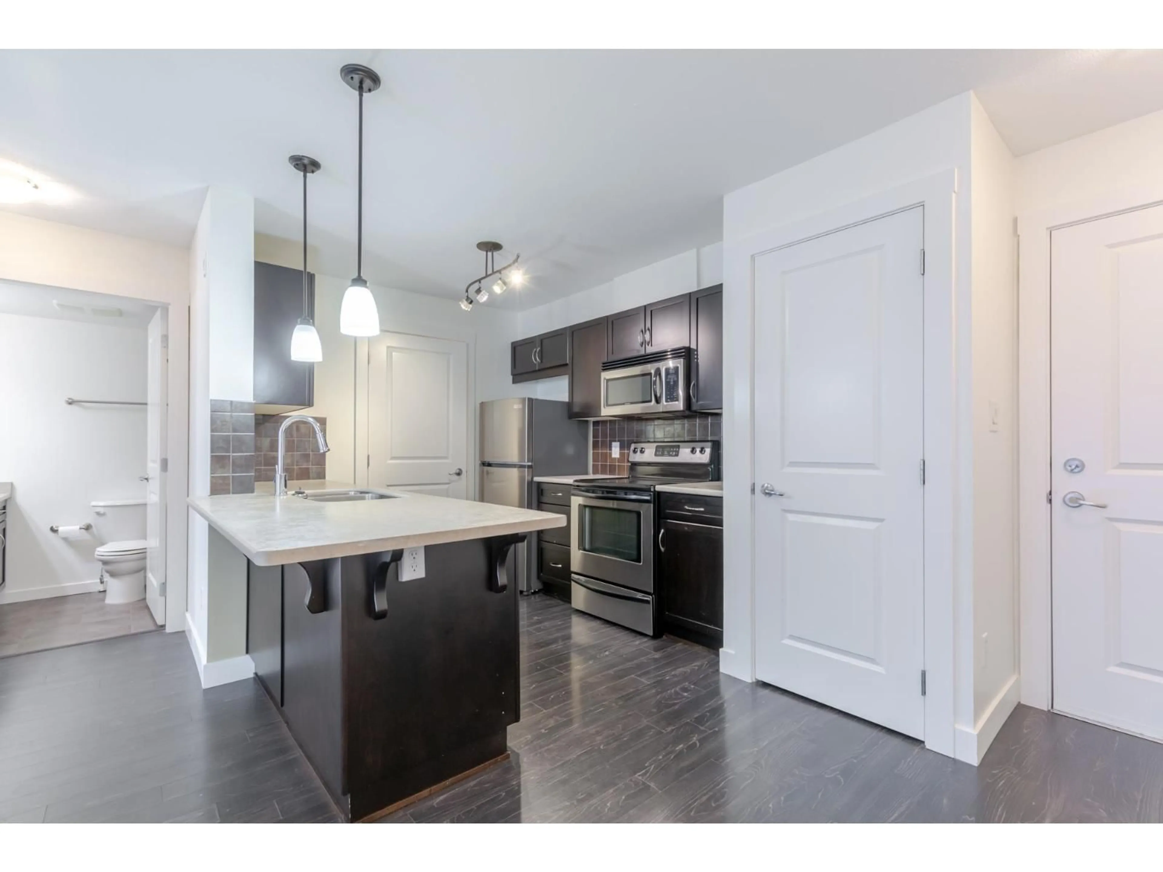 Open concept kitchen, unknown for 204 - 2038 SANDALWOOD CRESCENT, Abbotsford British Columbia V2S3H6