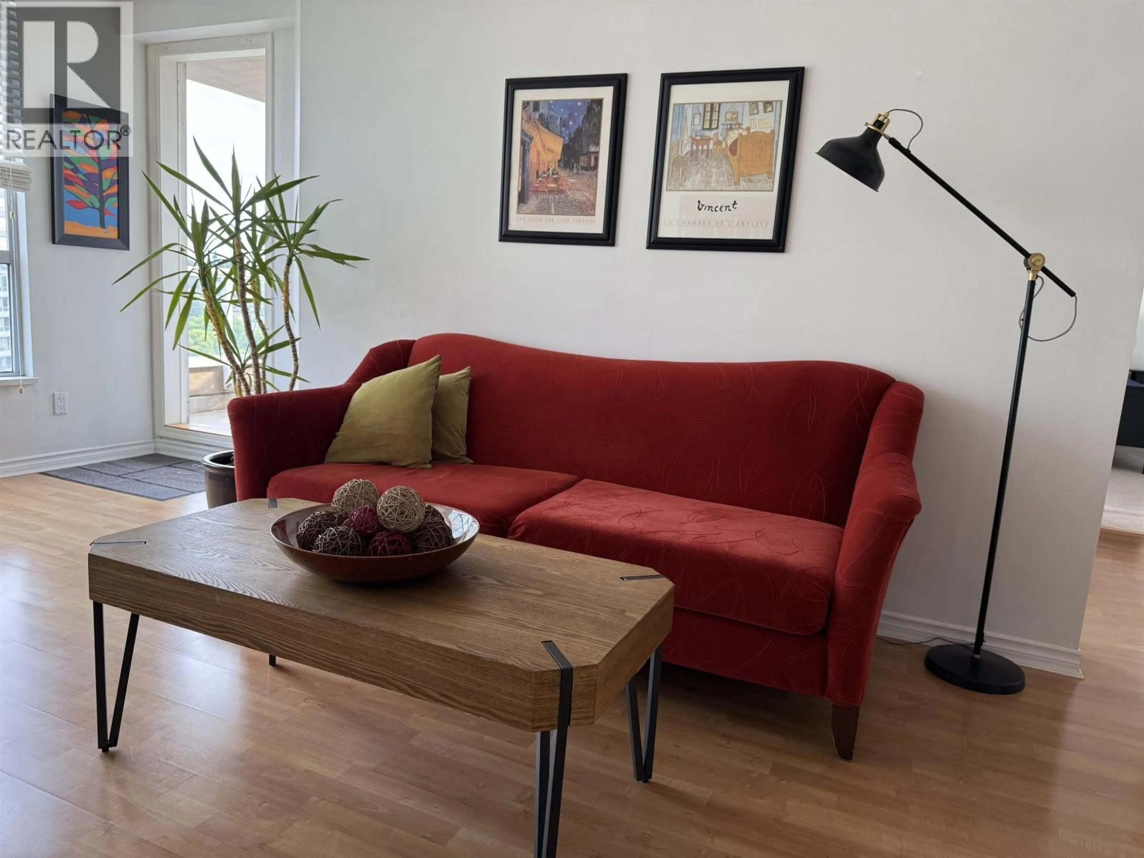 Living room with furniture, wood/laminate floor for 1203 - 5189 GASTON STREET, Vancouver British Columbia V5R6C7