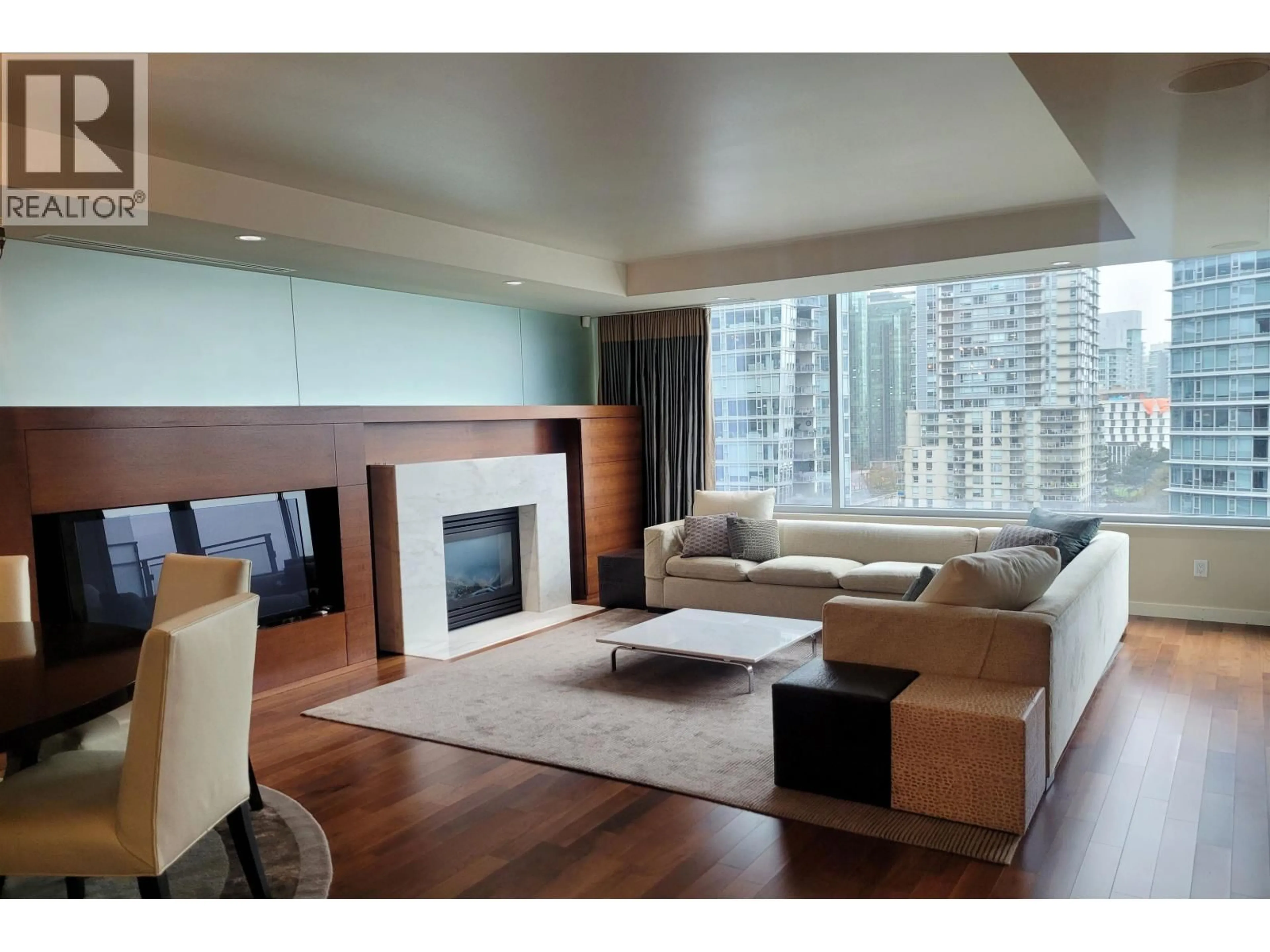 Living room with furniture, wood/laminate floor for 903 - 1169 CORDOVA STREET, Vancouver British Columbia V6C3T1