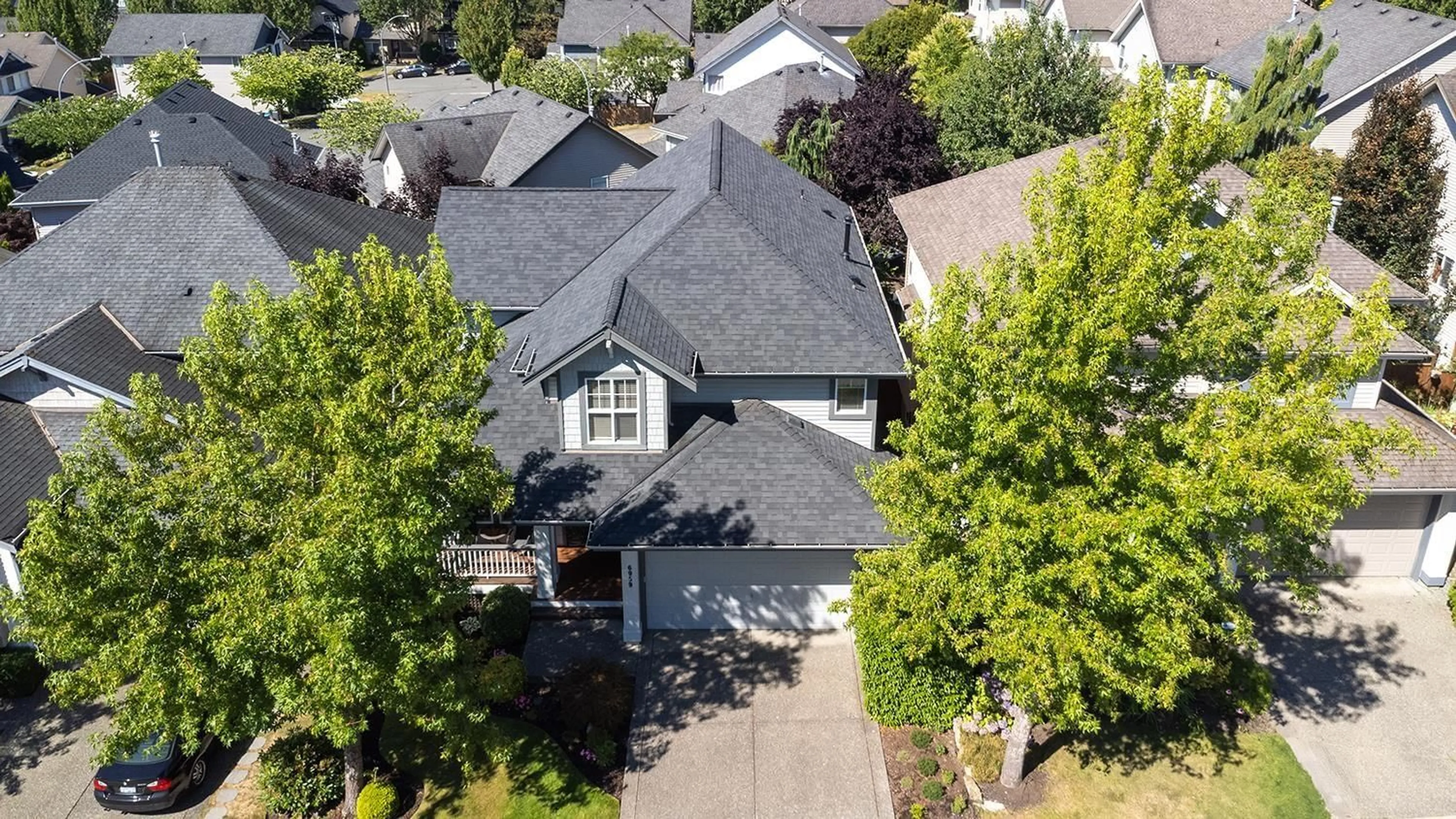 A pic from outside/outdoor area/front of a property/back of a property/a pic from drone, street for 6959 201B STREET, Langley British Columbia V2Y2Y1