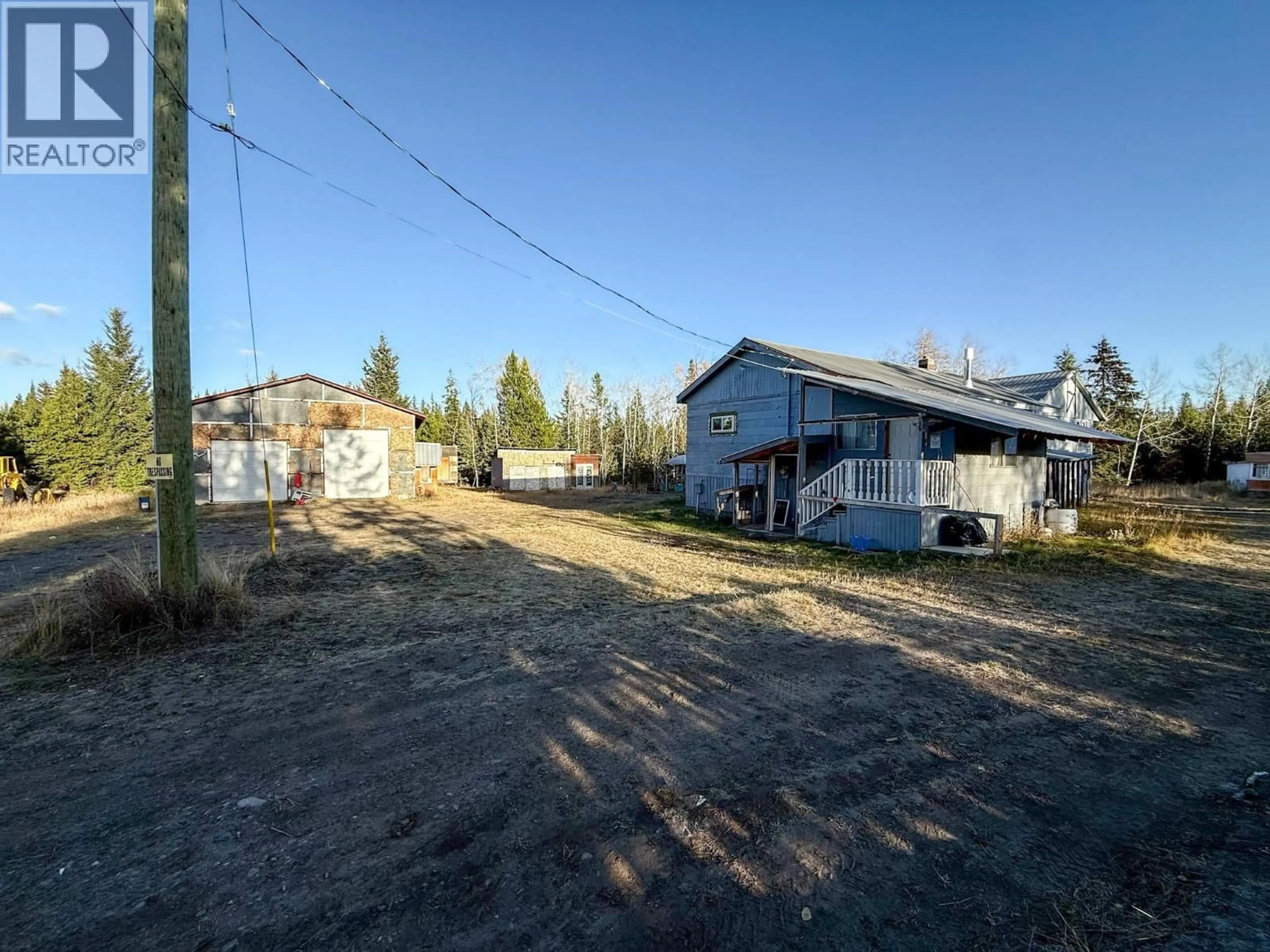 A pic from outside/outdoor area/front of a property/back of a property/a pic from drone, street for 7031 INMAN ROAD, Lone Butte British Columbia V0K2E2
