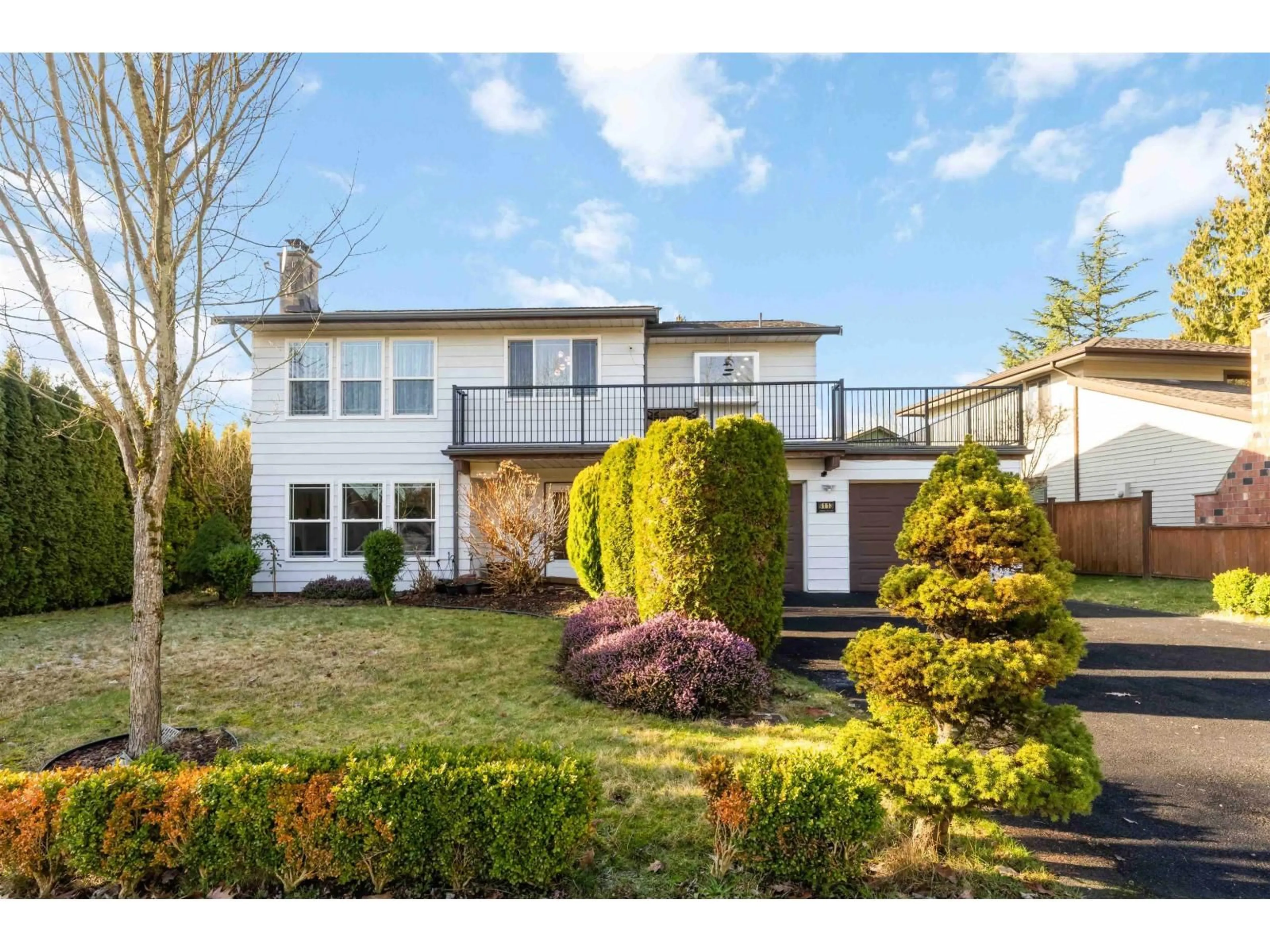 Home with vinyl exterior material, street for 9113 145A STREET, Surrey British Columbia V3R7L6