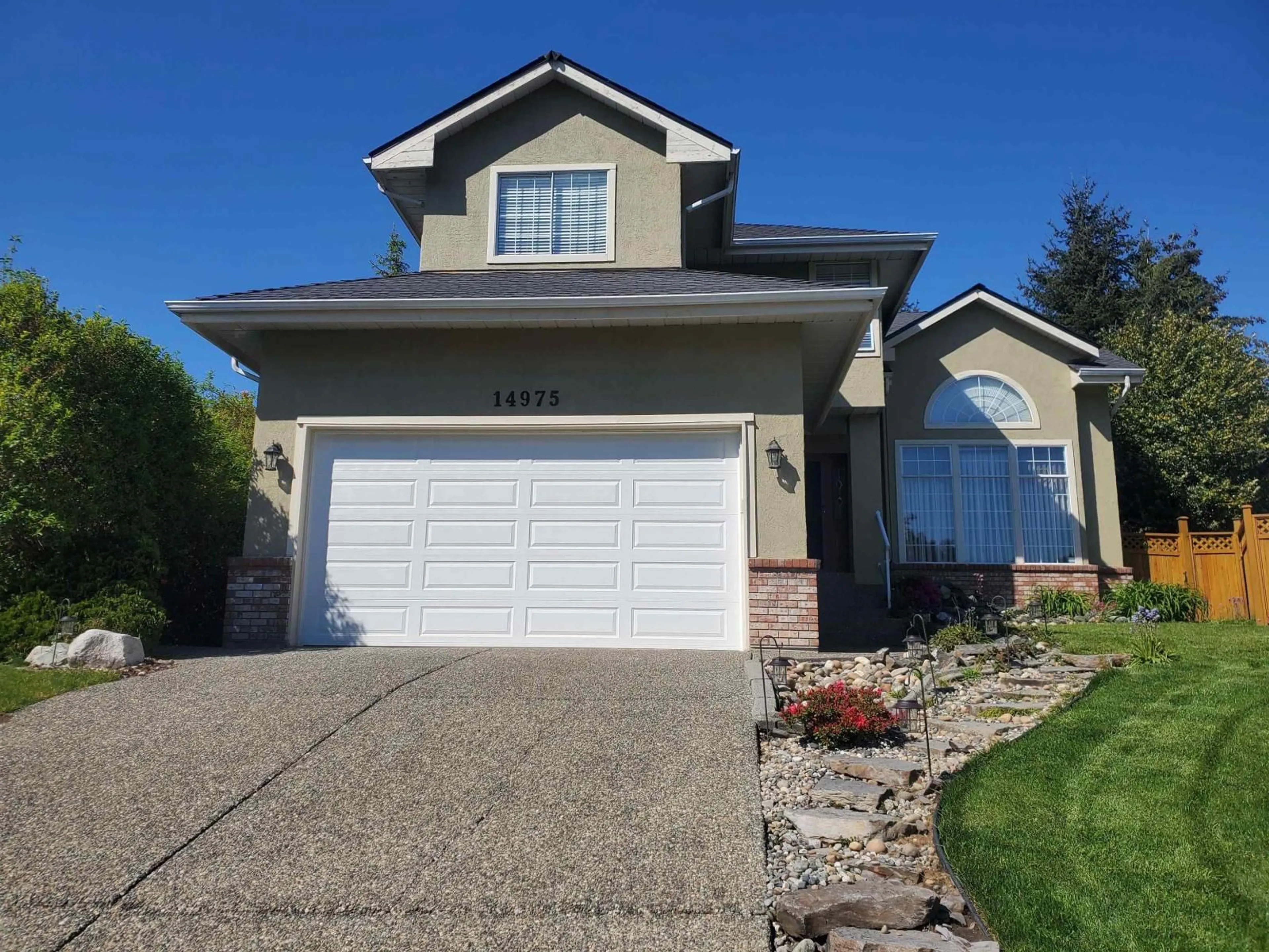 Home with vinyl exterior material, street for 14975 83A AVENUE, Surrey British Columbia V3S7S2