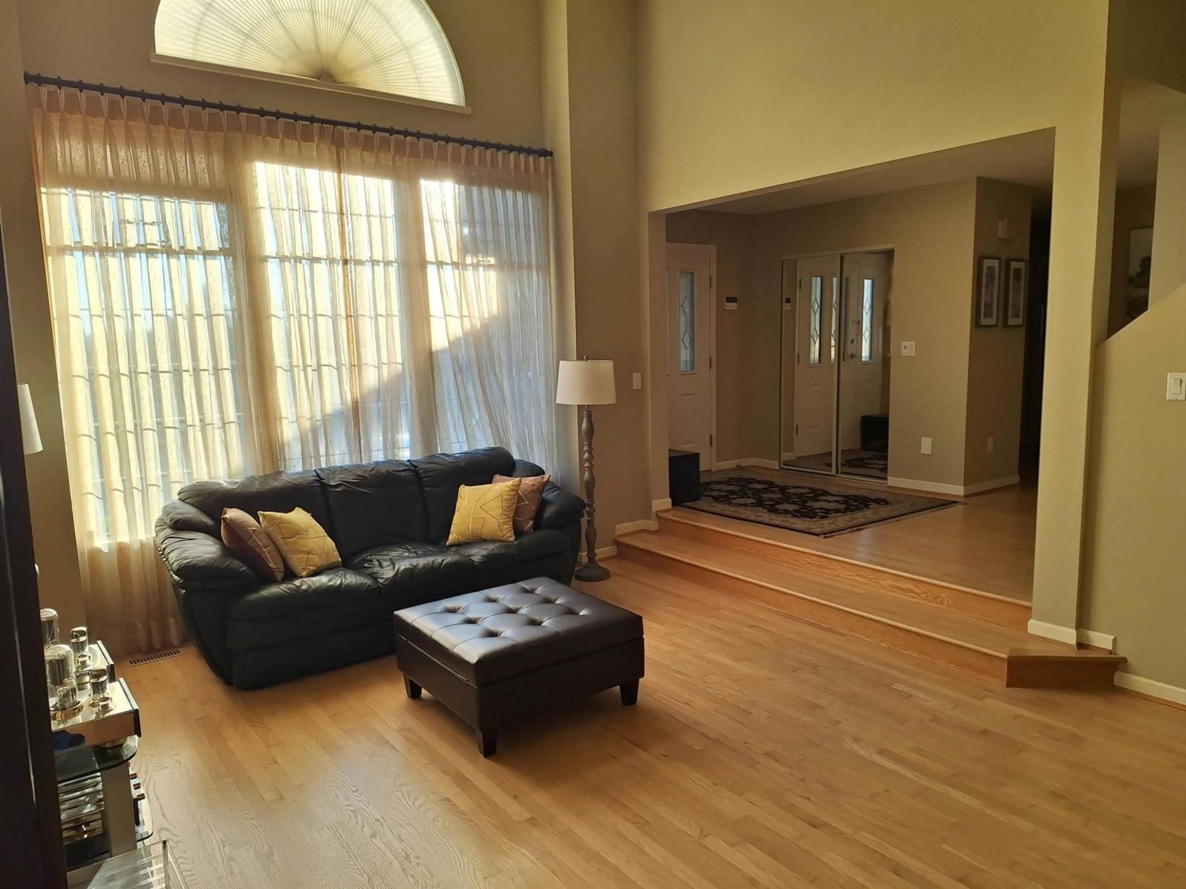 Living room with furniture, wood/laminate floor for 14975 83A AVENUE, Surrey British Columbia V3S7S2