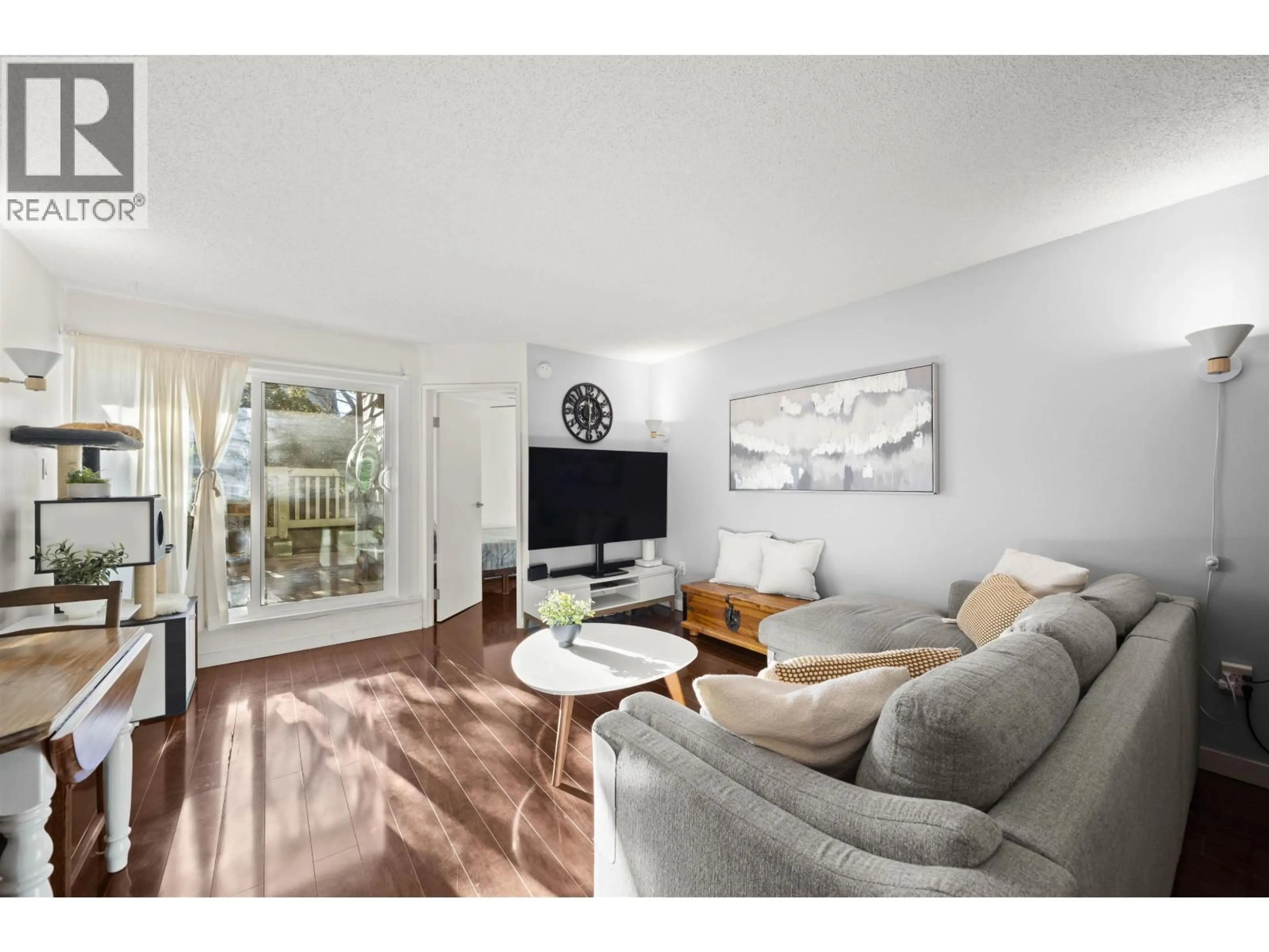 Living room with furniture, wood/laminate floor for 114 - 1545 E 2ND AVENUE, Vancouver British Columbia V5N1C8