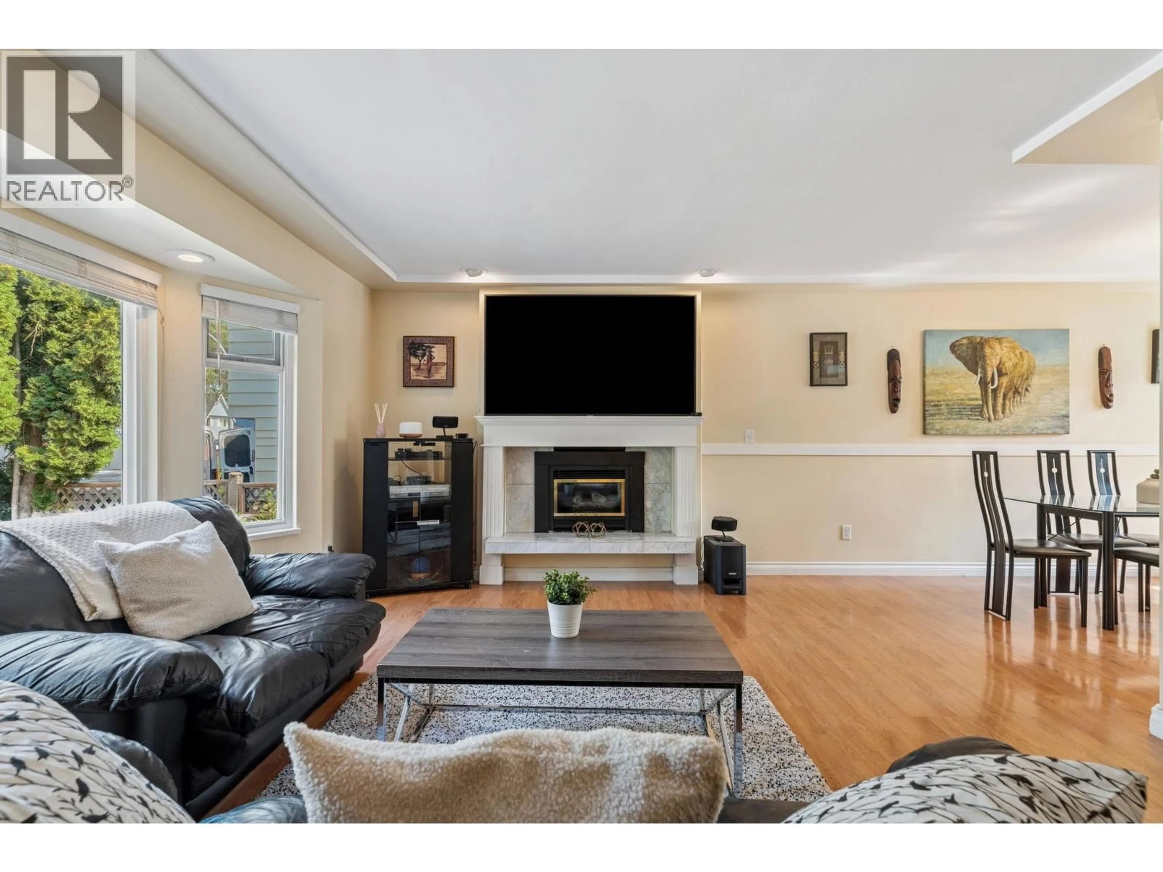 Living room with furniture, wood/laminate floor for 1068 SPRUCE AVENUE, Port Coquitlam British Columbia V3B4X6