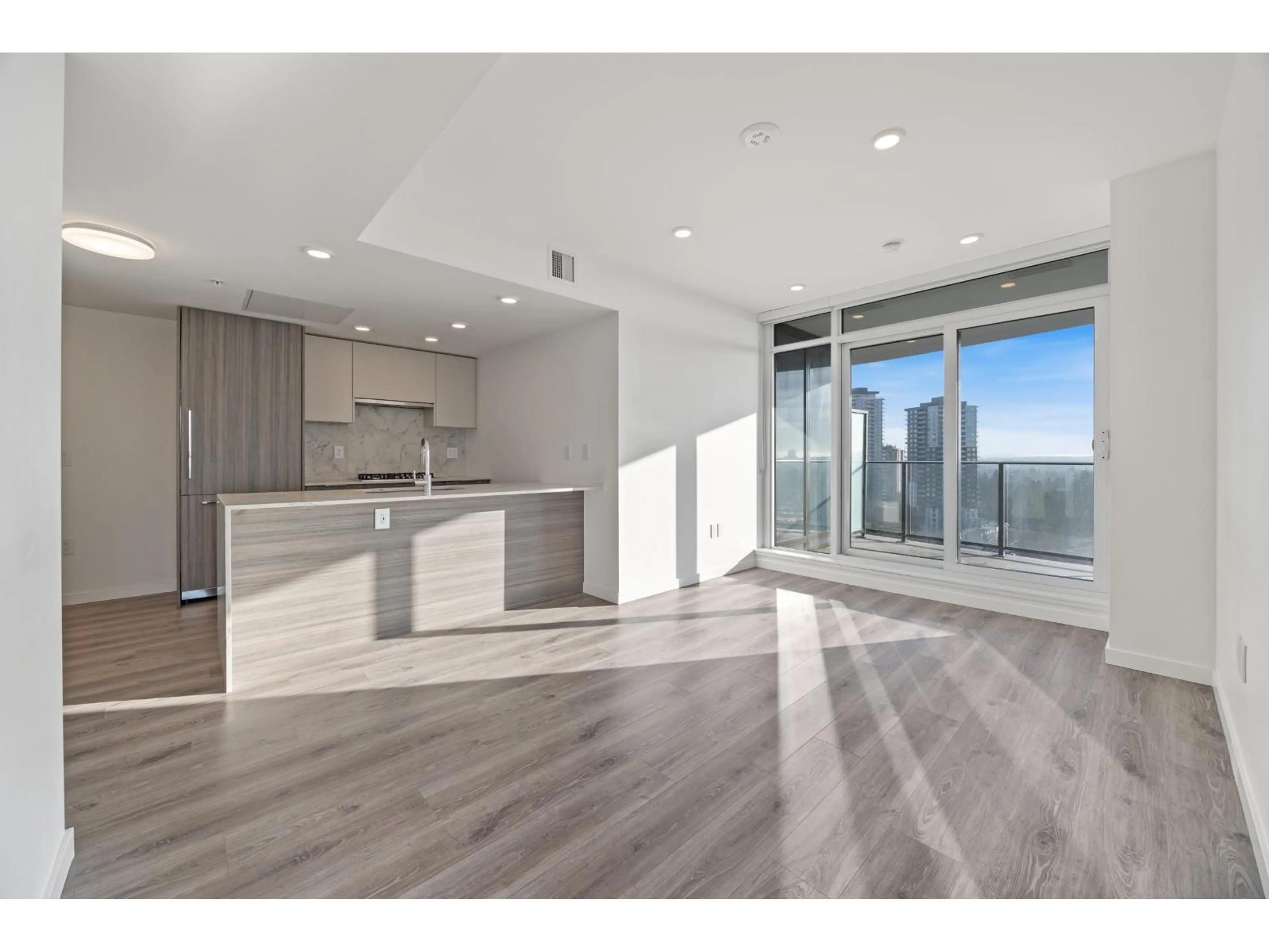 Open concept kitchen, wood/laminate floor for 1804 - 10333 133 STREET, Surrey British Columbia V3T0V1