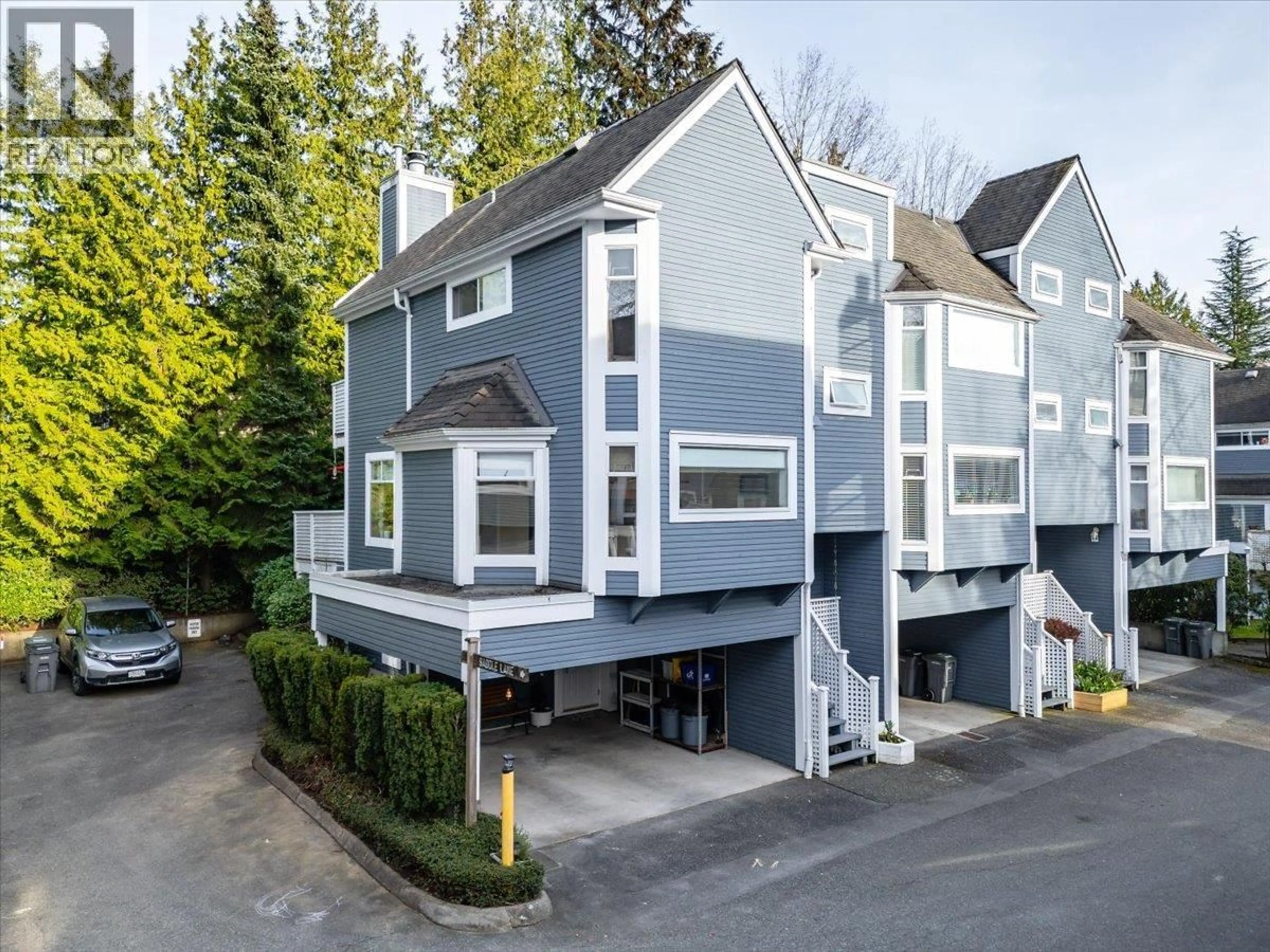 A pic from outside/outdoor area/front of a property/back of a property/a pic from drone, street for 7338 FOXHOUND MEWS, Vancouver British Columbia V5S4L5