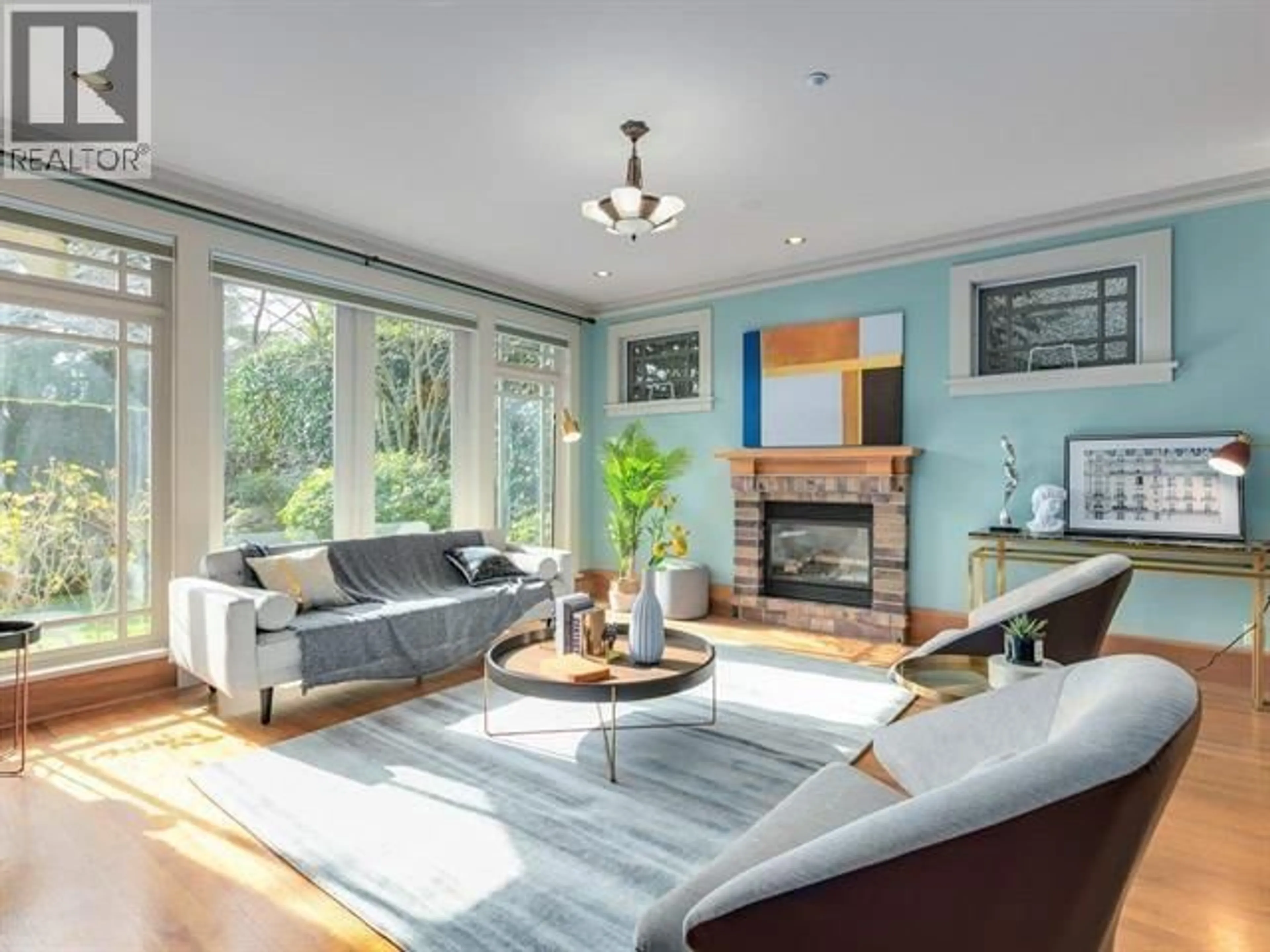 Living room with furniture, wood/laminate floor for 4035 27TH AVENUE, Vancouver British Columbia V6S1R6