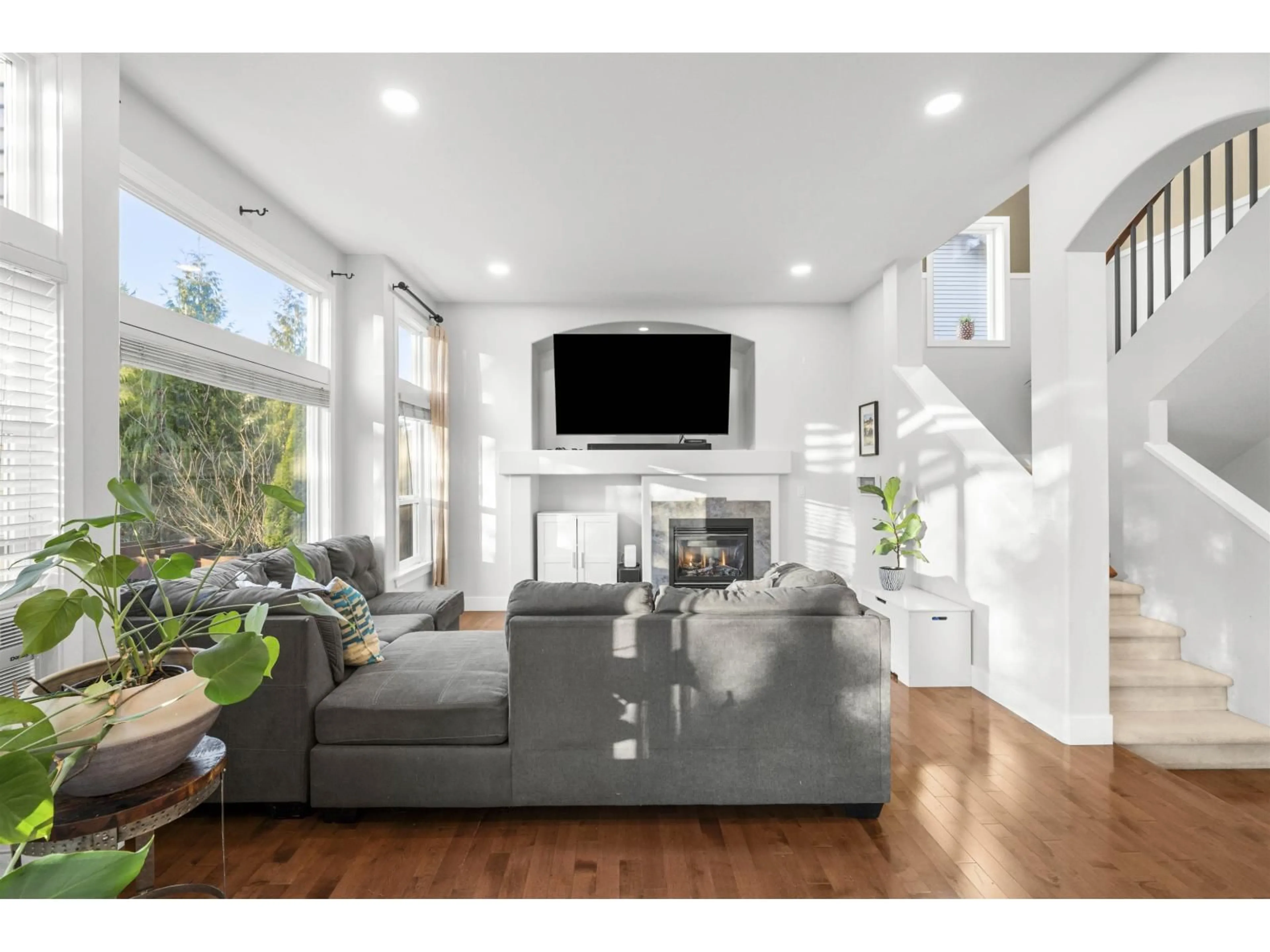 Living room with furniture, wood/laminate floor for 7339 200A STREET, Langley British Columbia V2Y3G5