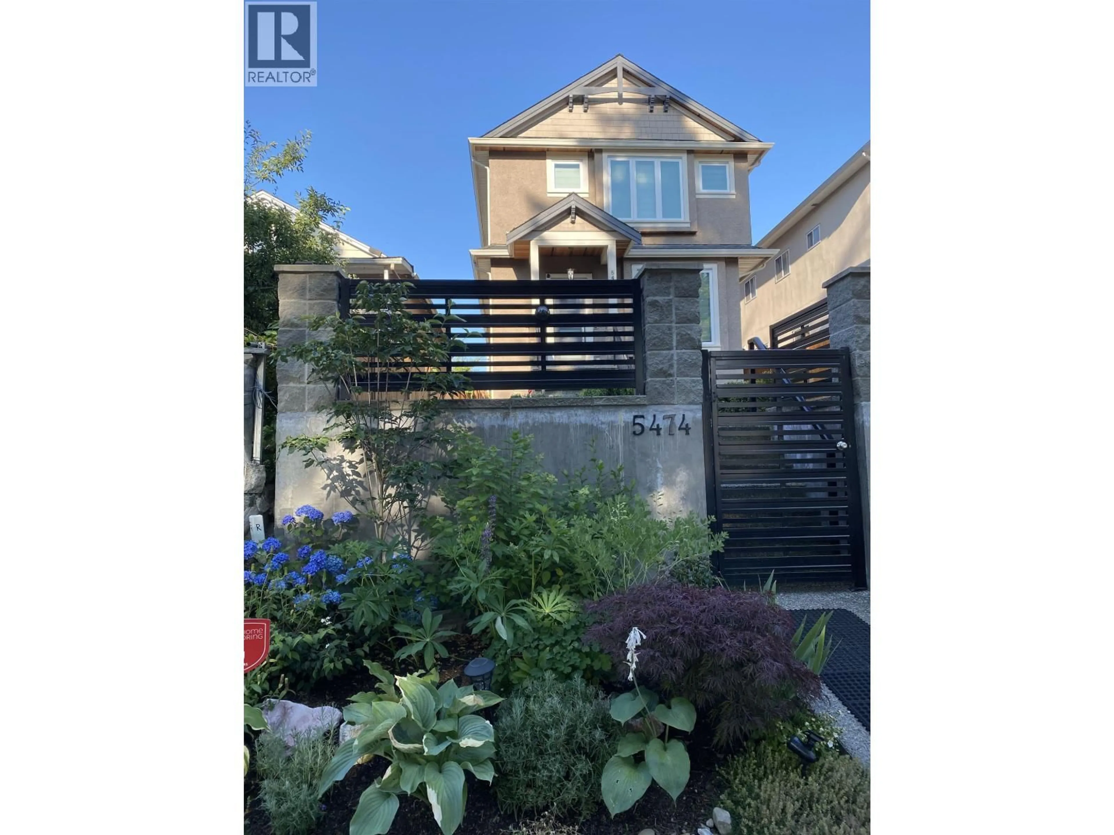 A pic from outside/outdoor area/front of a property/back of a property/a pic from drone, street for 5474 DUNDEE STREET, Vancouver British Columbia V5R3T9