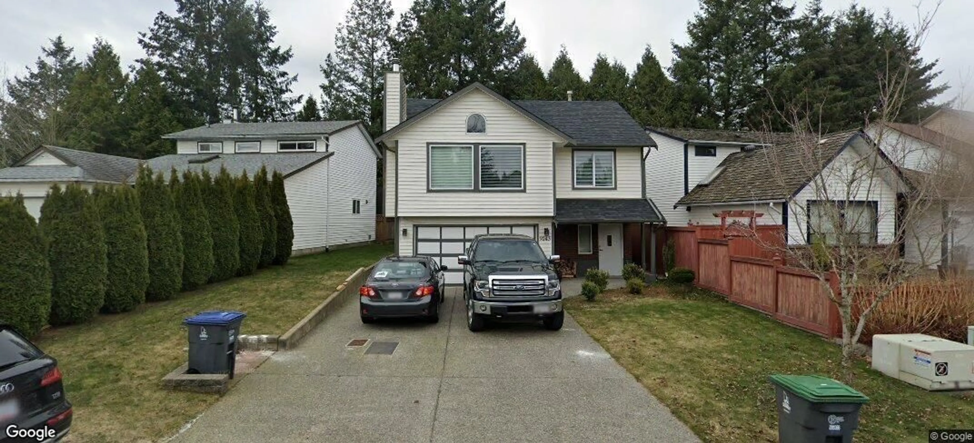Home with vinyl exterior material, street for 9043 155 STREET, Surrey British Columbia V3R8W3