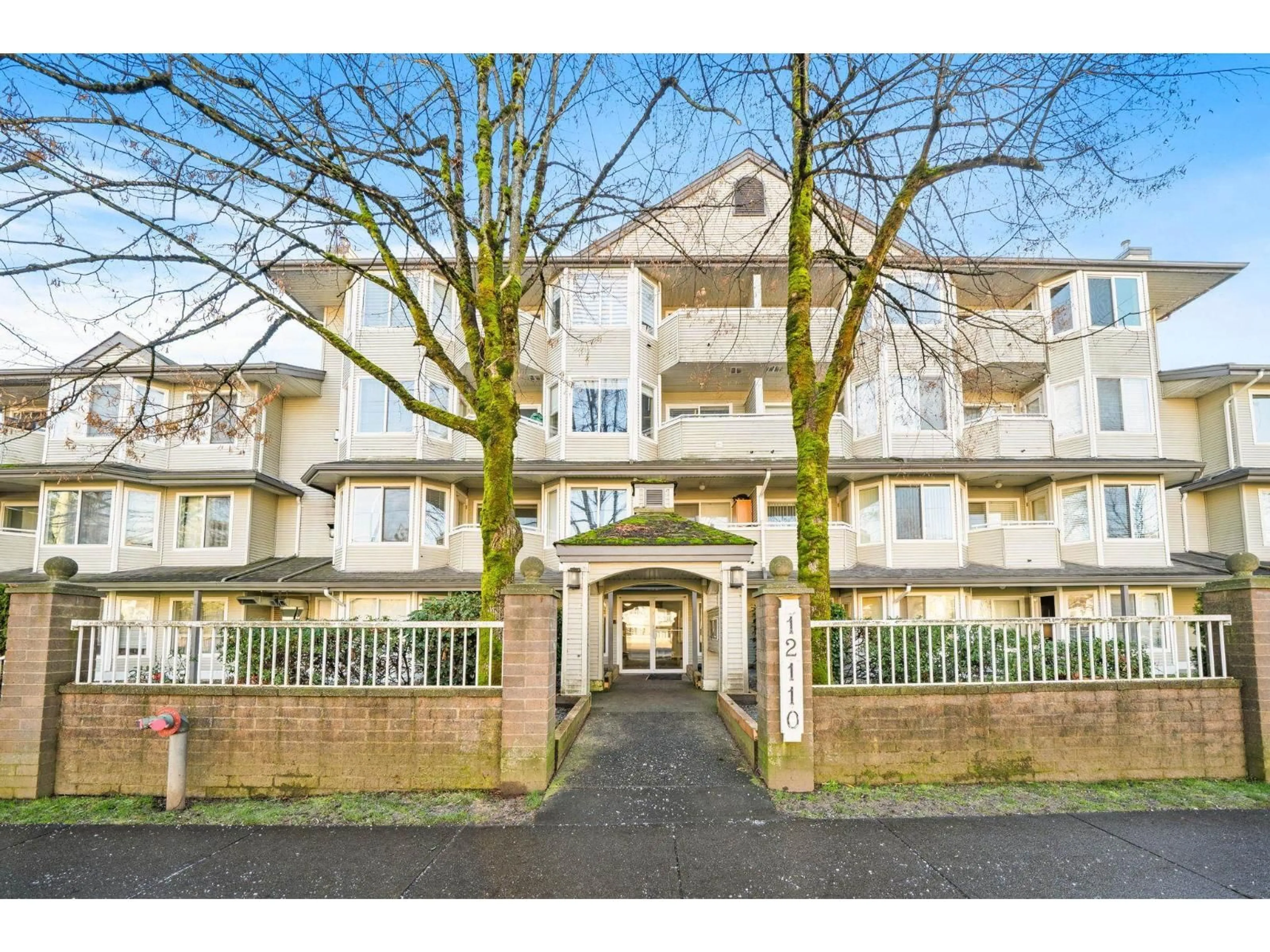 A pic from outside/outdoor area/front of a property/back of a property/a pic from drone, building for 201 - 12110 80 AVENUE, Surrey British Columbia V3W0V2